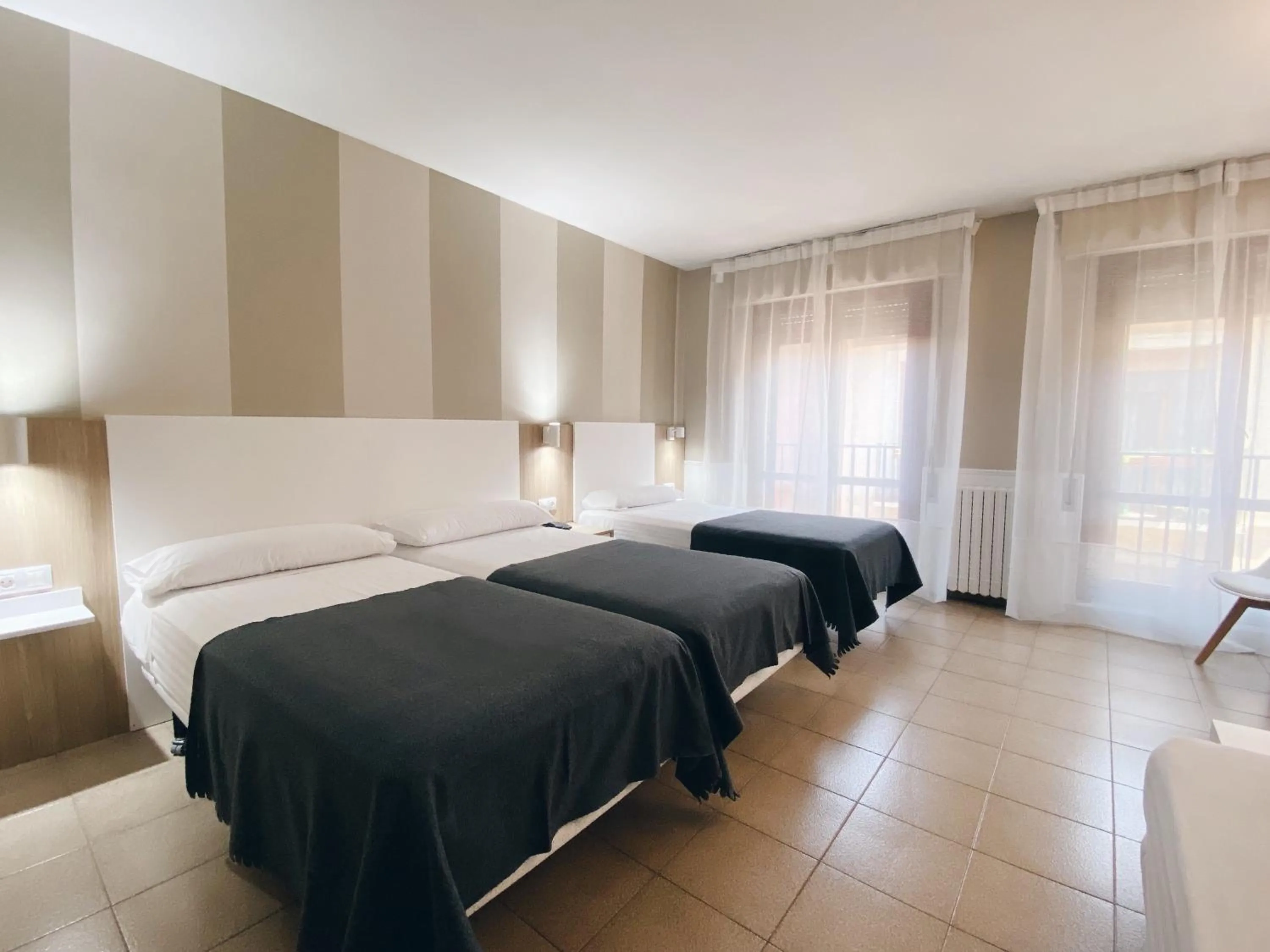 Bed in Hotel Rio Arga