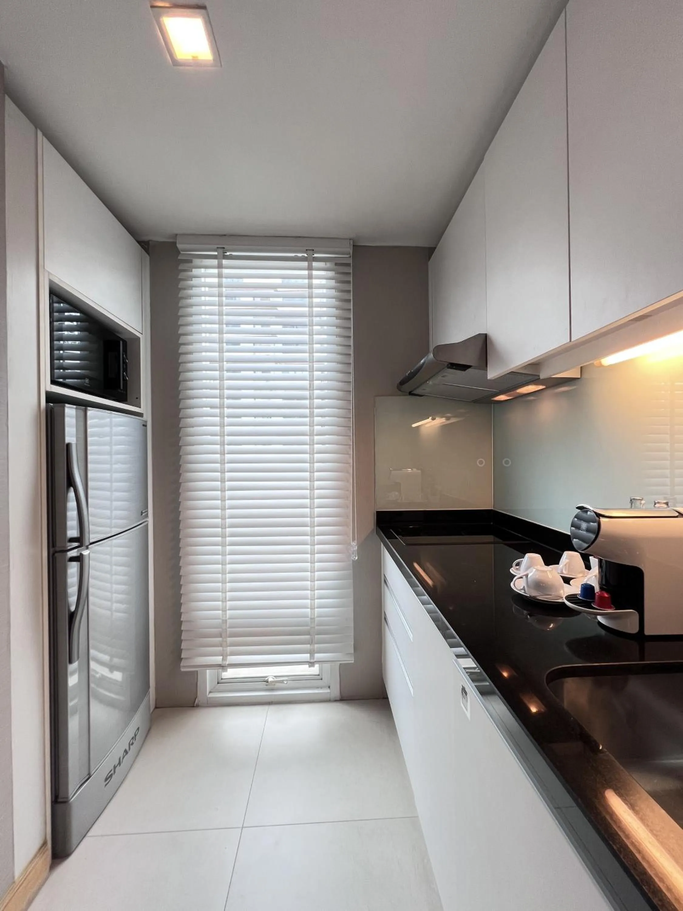 Kitchen or kitchenette in Sora Resort & Suites Sukhumvit