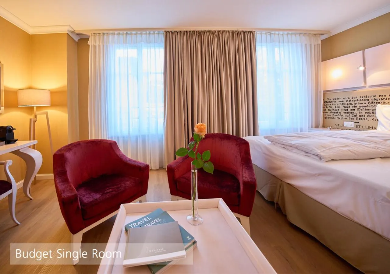 Bedroom, Bed in Lenkerhof gourmet spa resort - Relais & Châteaux