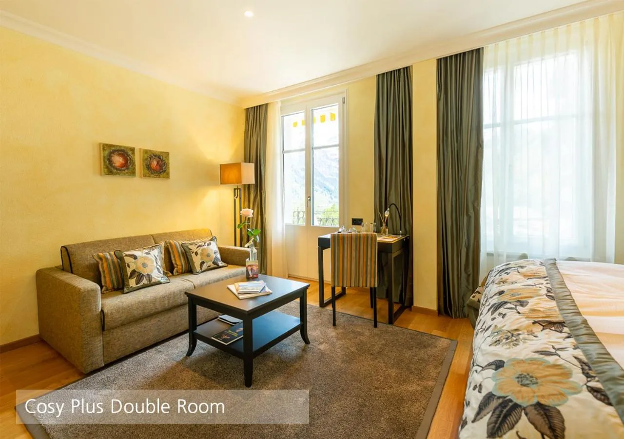 Living room, Bed in Lenkerhof gourmet spa resort - Relais & Châteaux