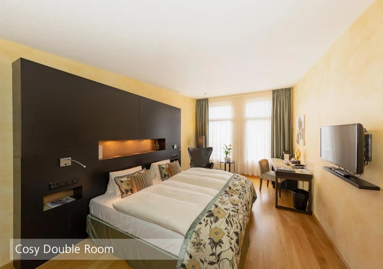 Bedroom, Bed in Lenkerhof gourmet spa resort - Relais & Châteaux