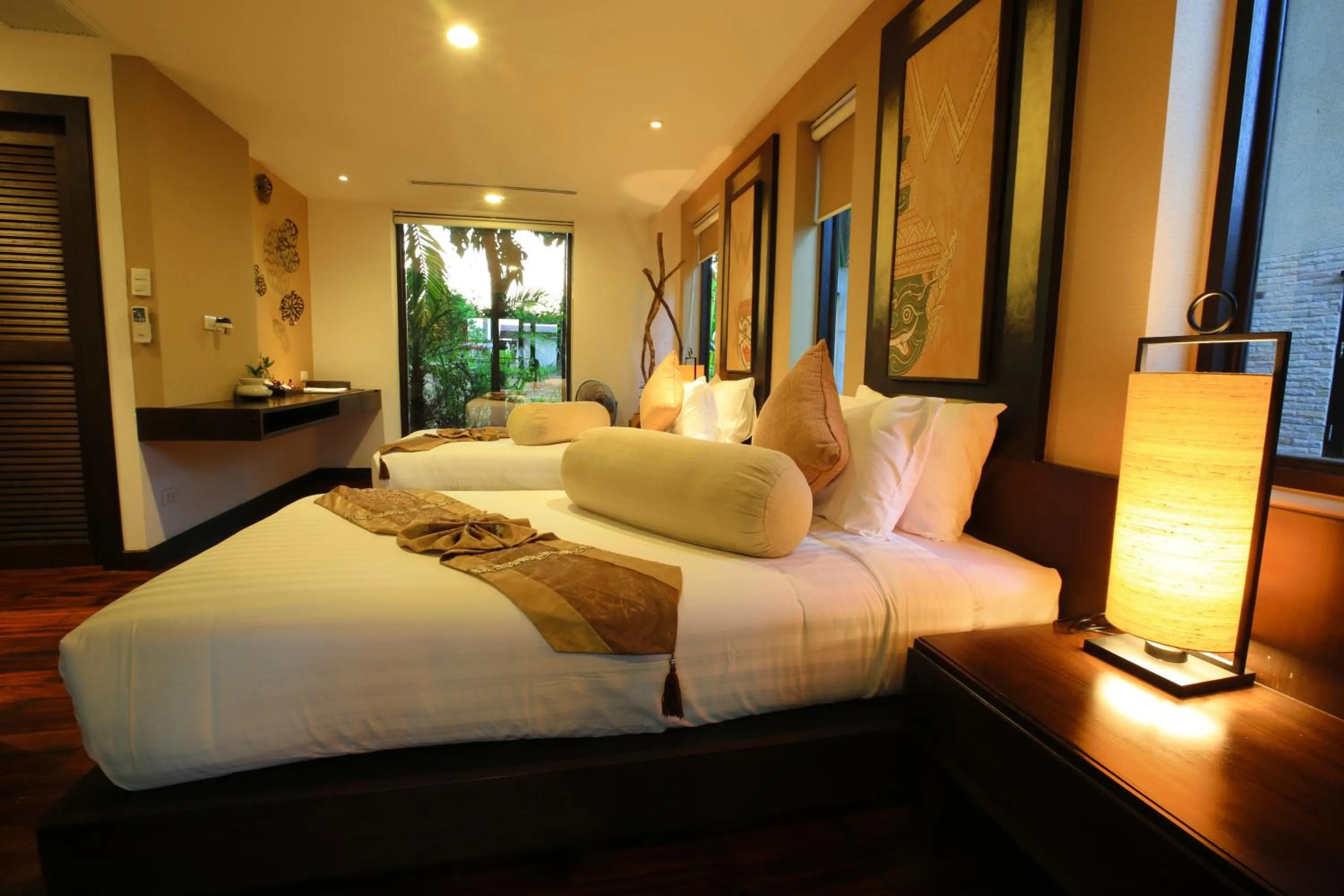 Photo of the whole room, Bed in Niramaya Villa & Wellness
