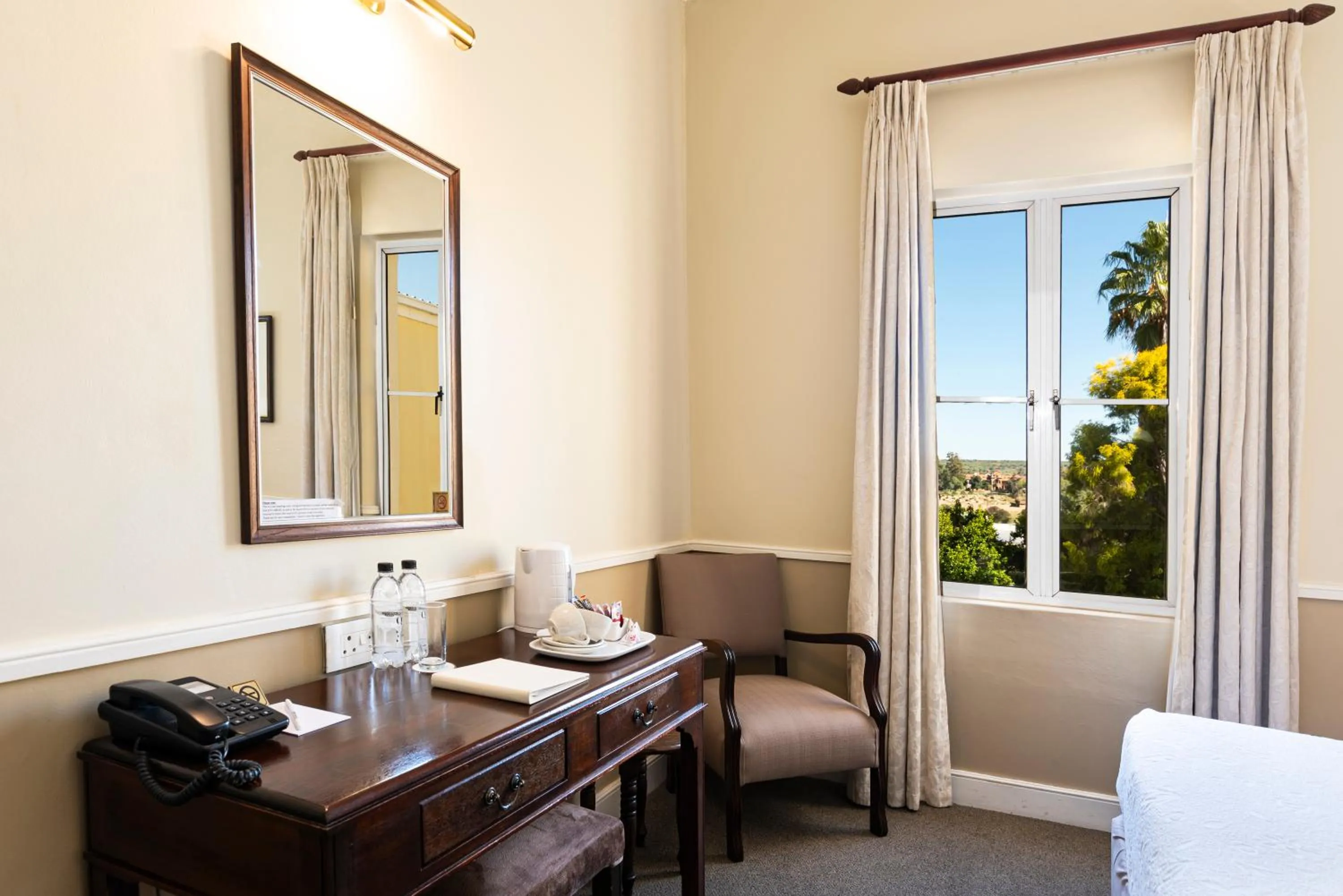Seating area in Queen's Hotel by BON Hotels