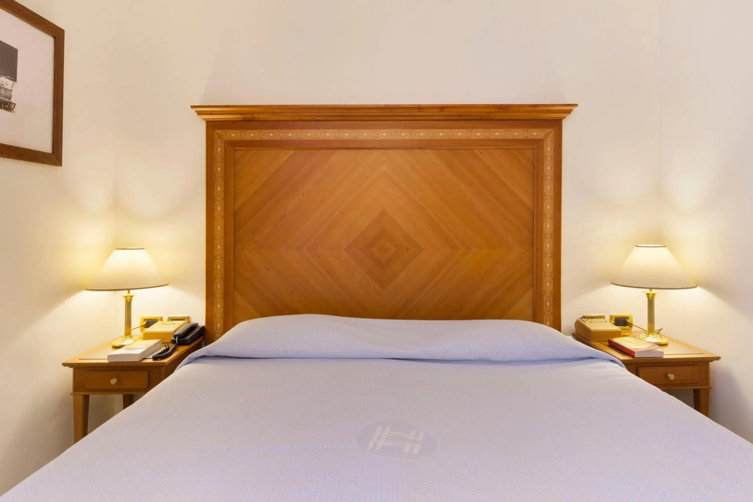 Bed in Hotel Continental Bed in Hotel Continental