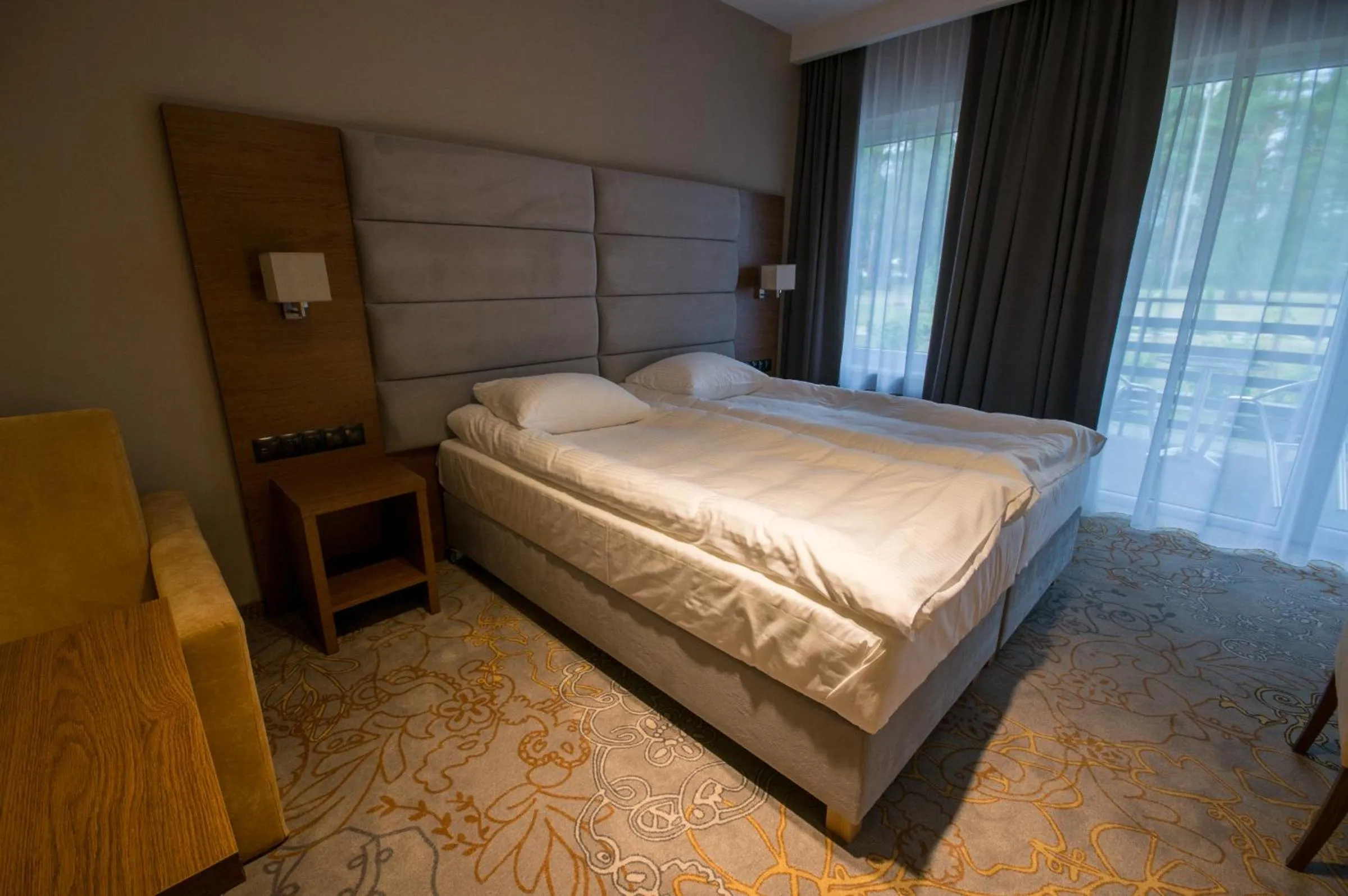 Bed in Rezydencja Sosnowa Luxury Hotel
