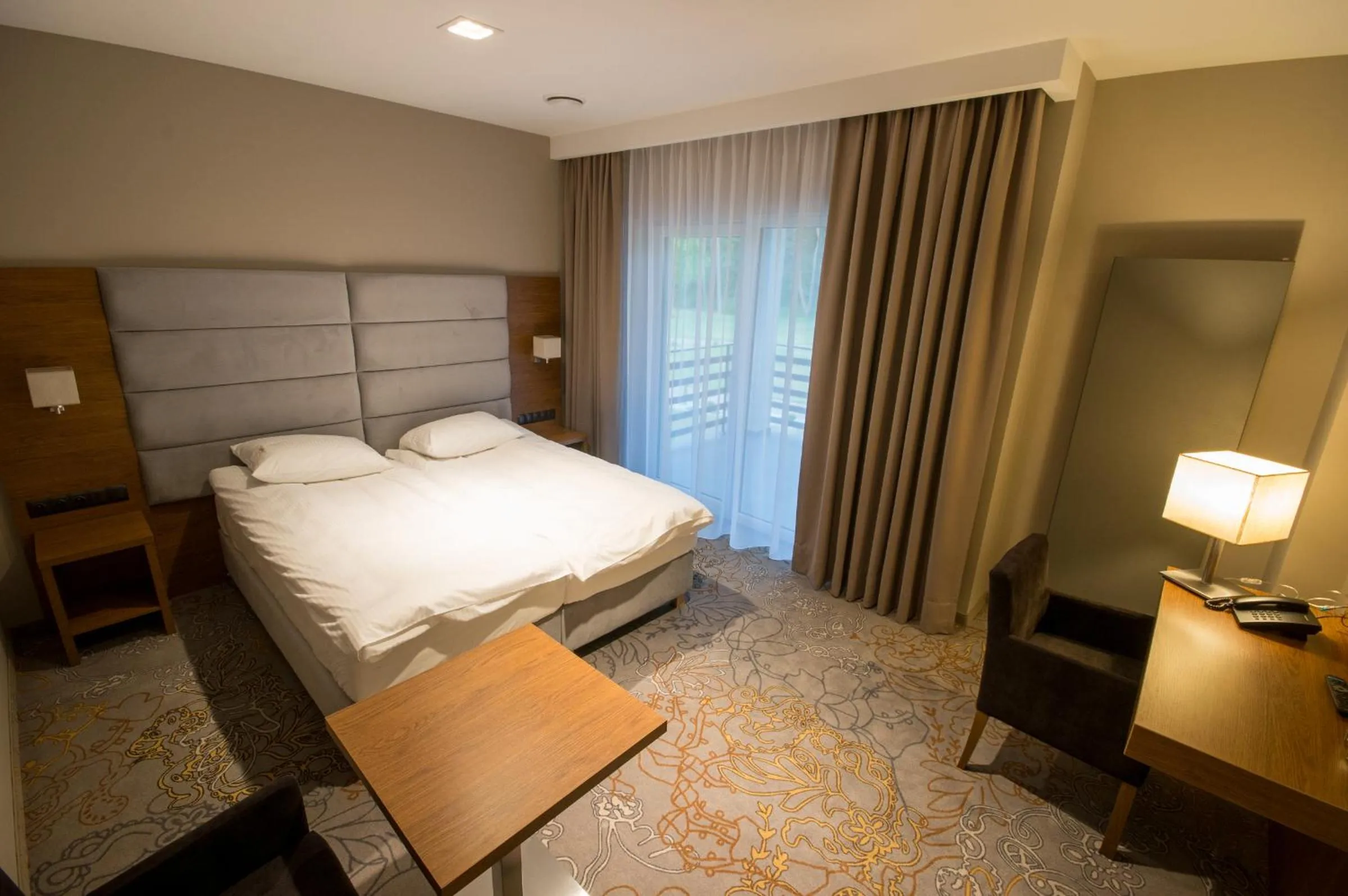 Bed in Rezydencja Sosnowa Luxury Hotel