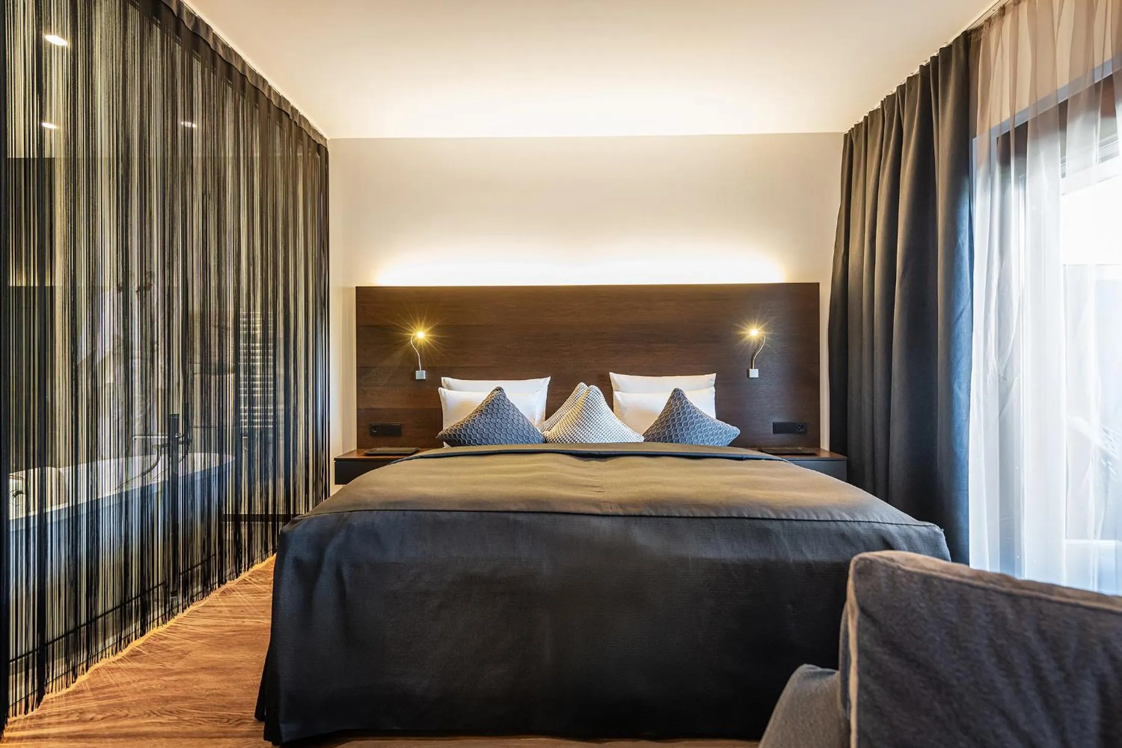 Bedroom, Bed in AlpenParks Hotel & Apartment Taxacher