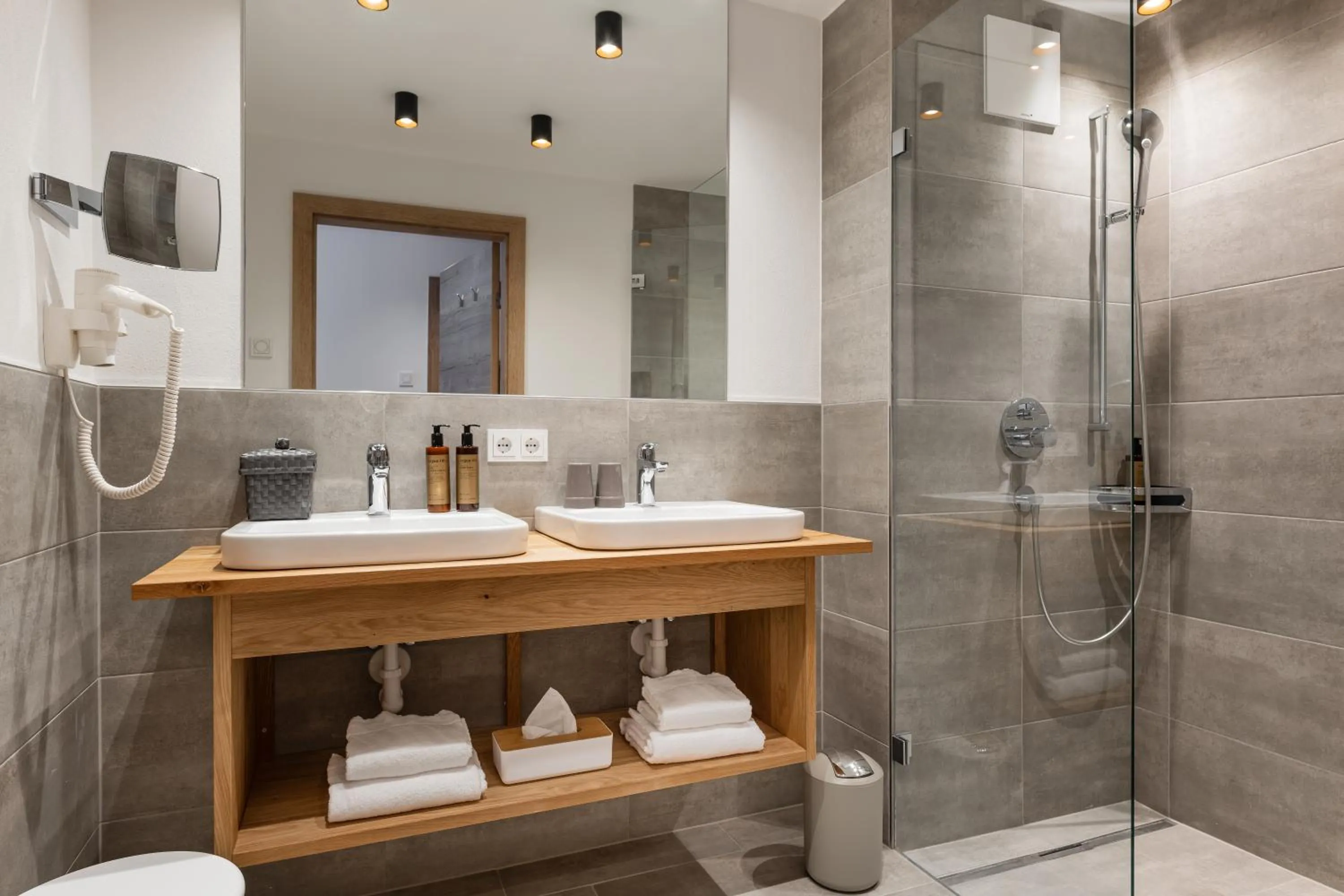 Bathroom in AlpenParks Hotel & Apartment Taxacher