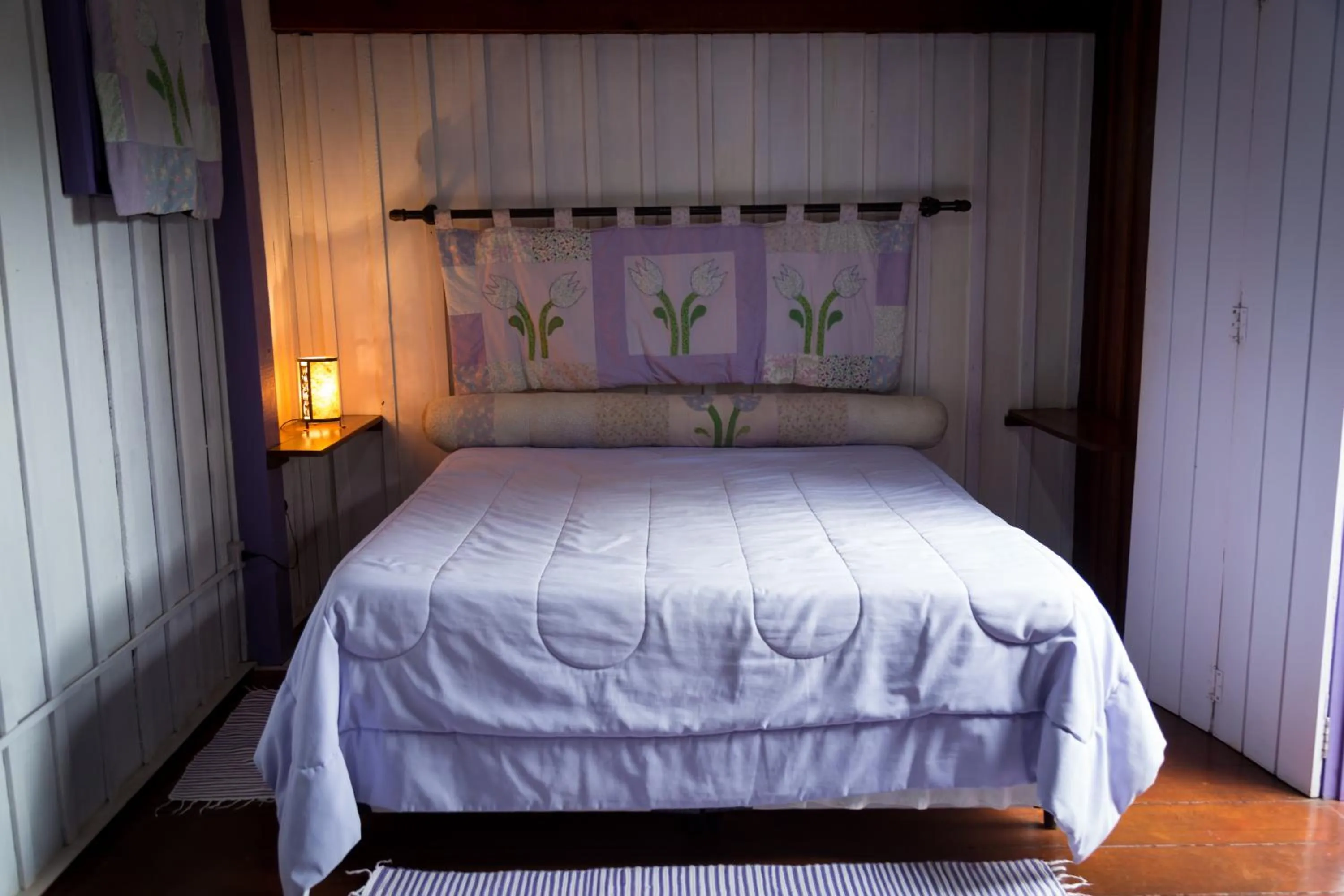 Bed in Pousada Trem das Cores