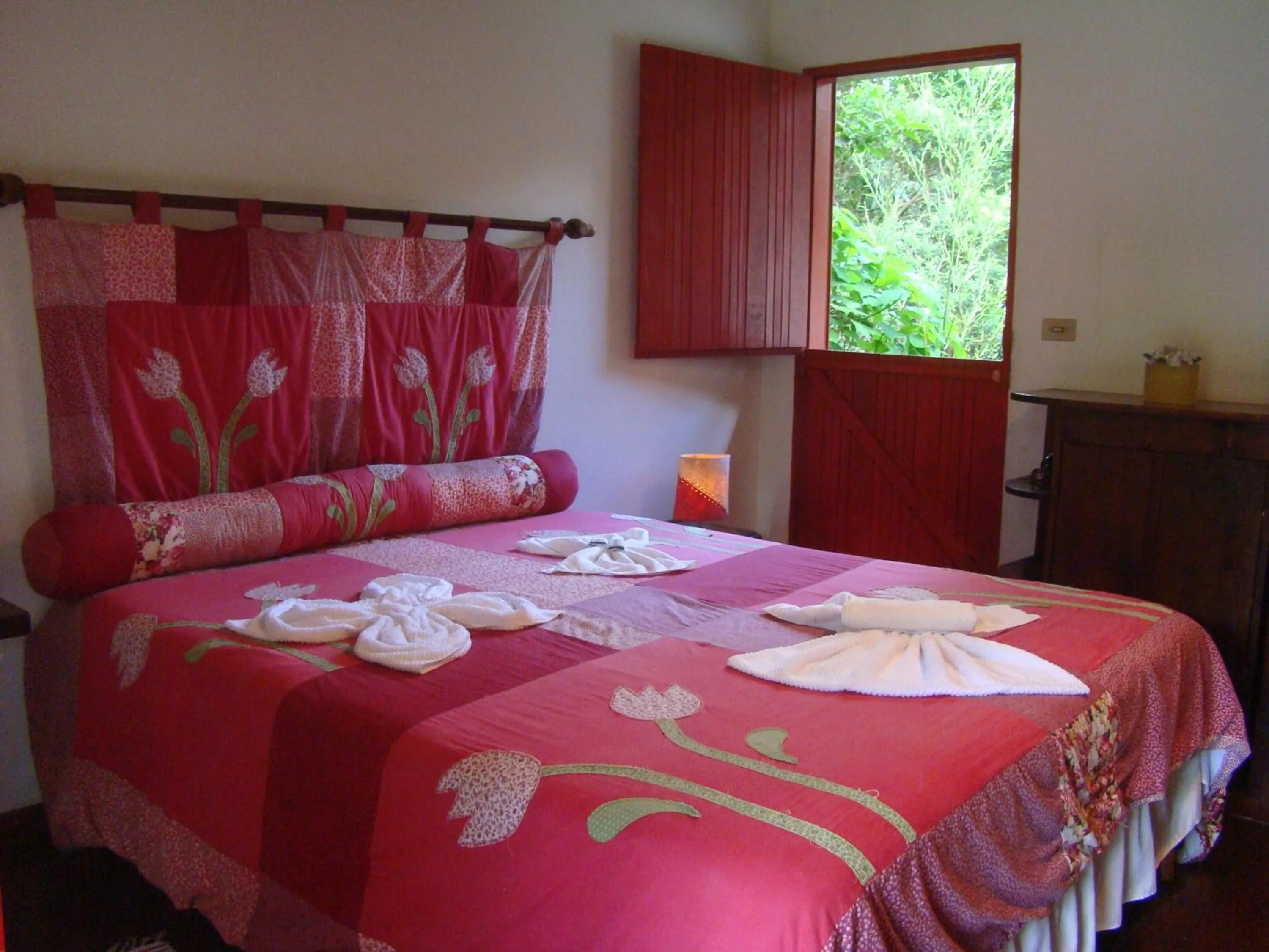 Bed in Pousada Trem das Cores