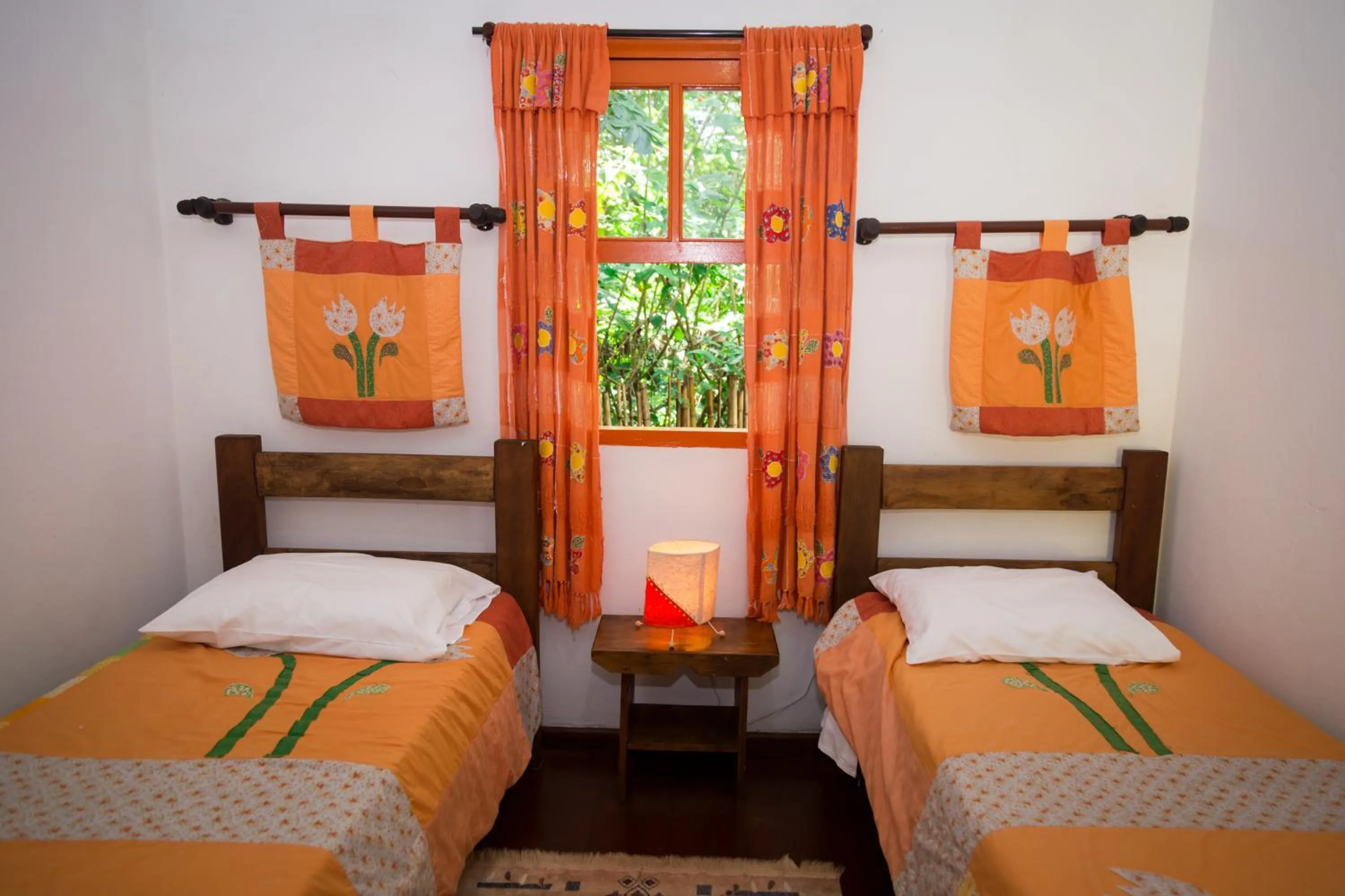 Bed in Pousada Trem das Cores