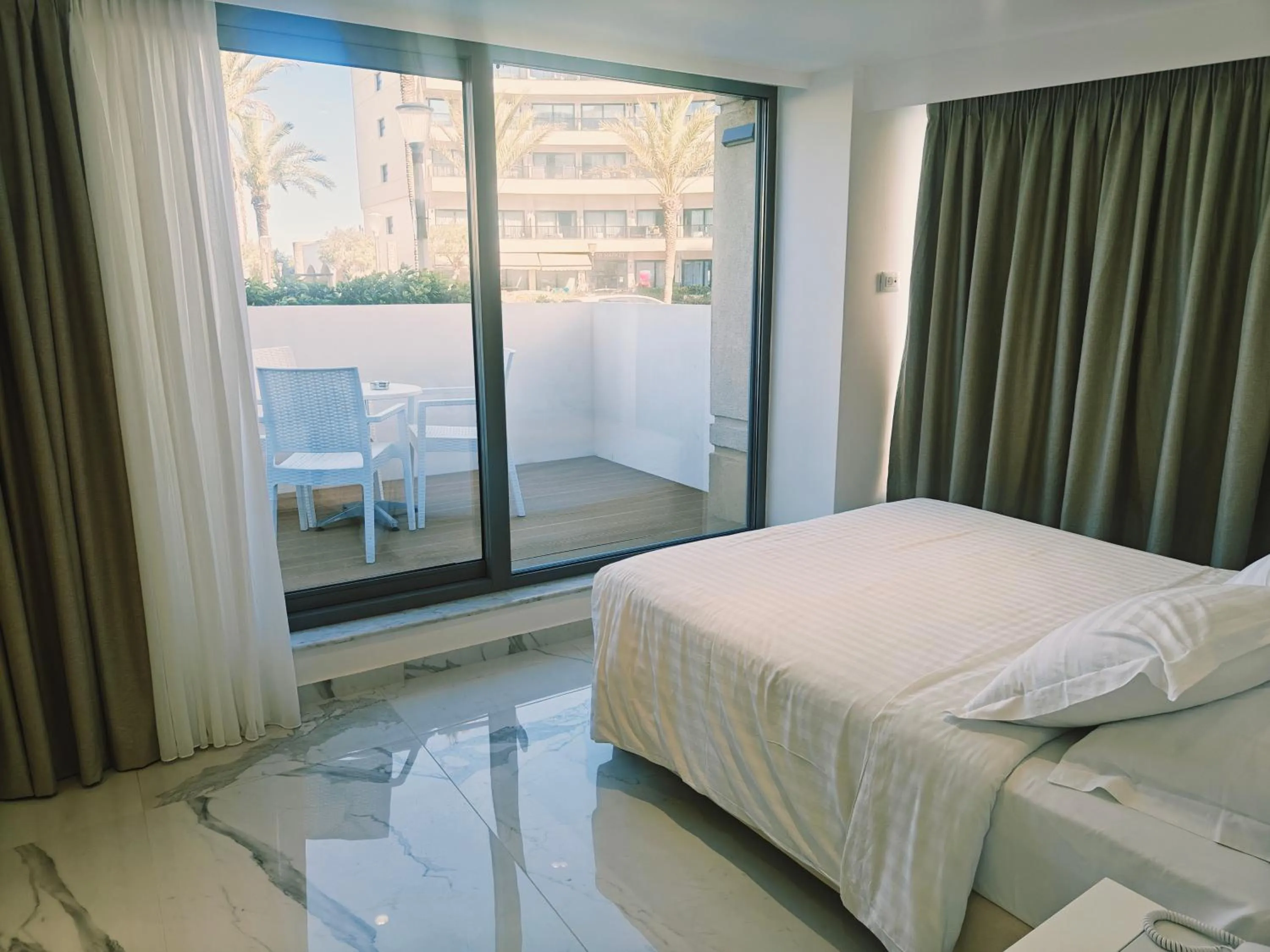 Bed in Ibiscus Hotel