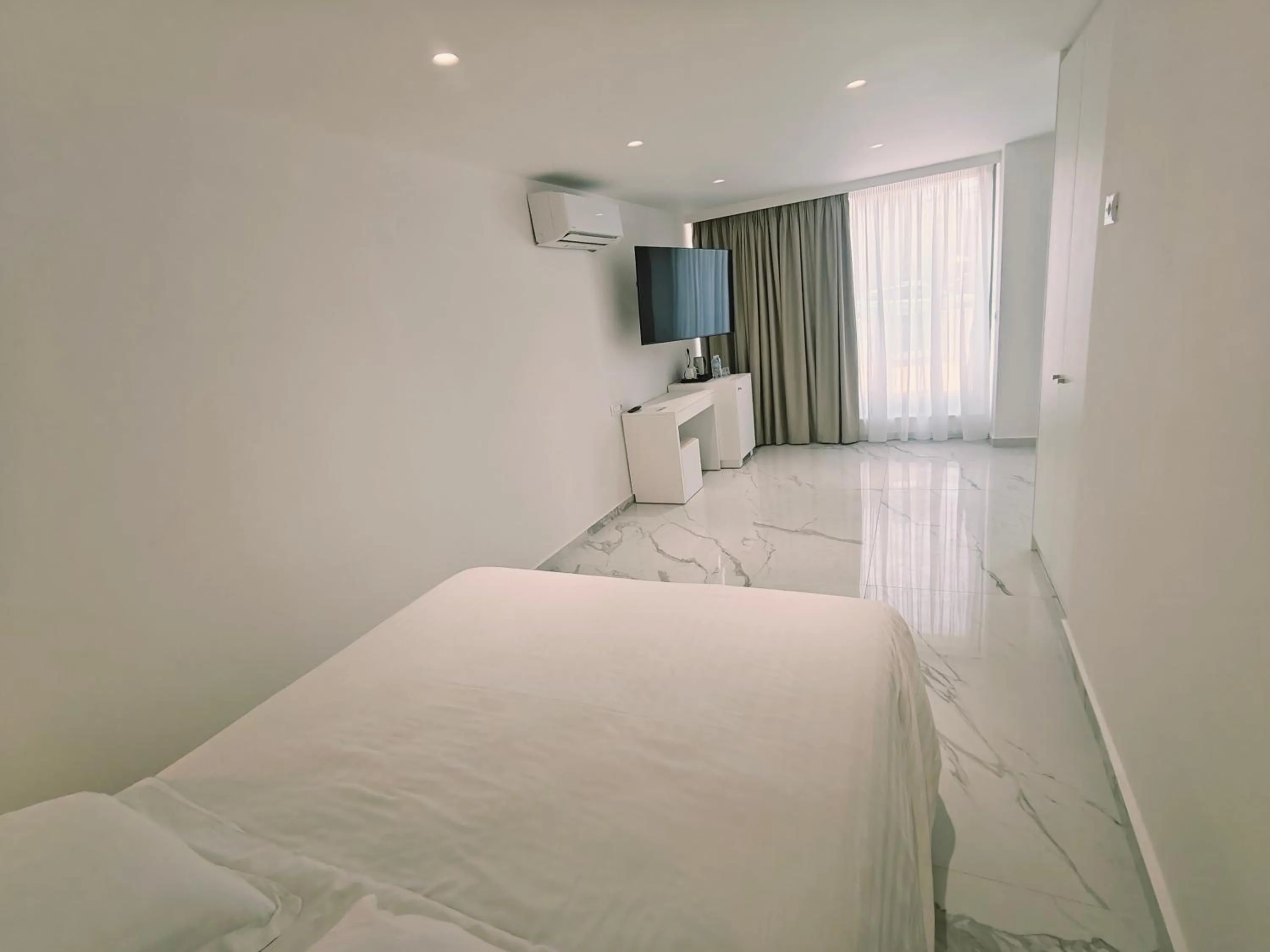 Bed in Ibiscus Hotel