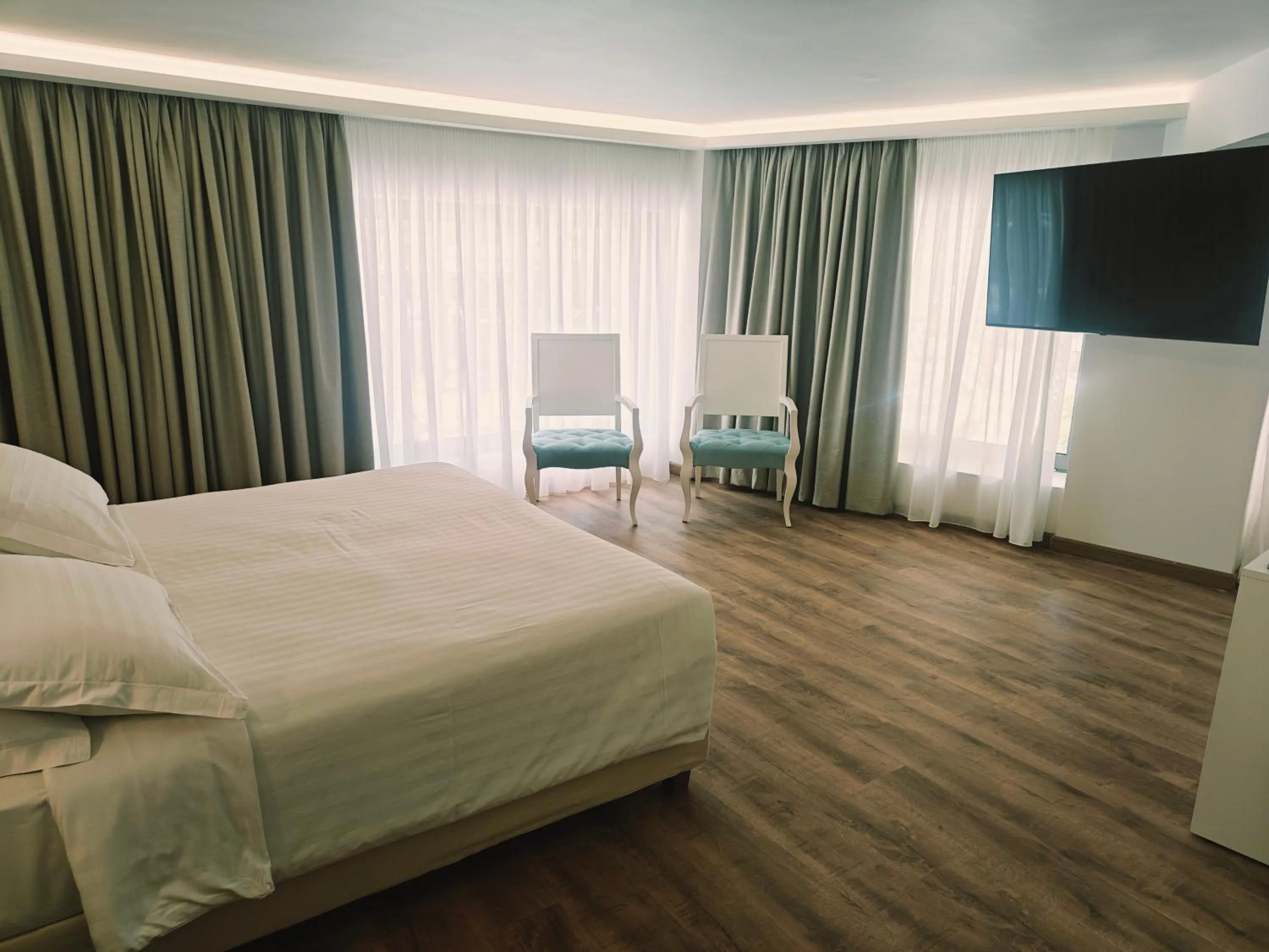Bed in Ibiscus Hotel