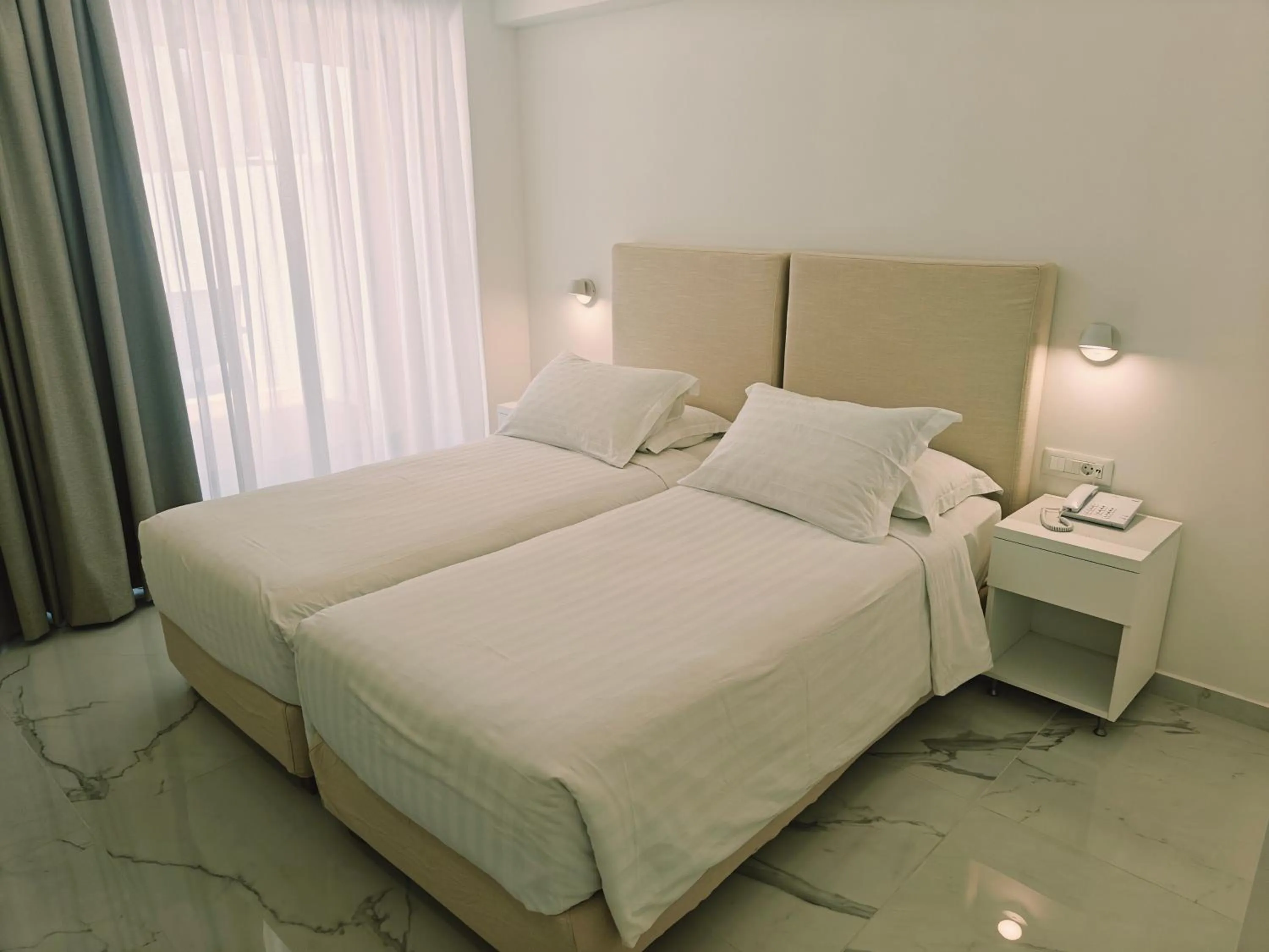 Bed in Ibiscus Hotel