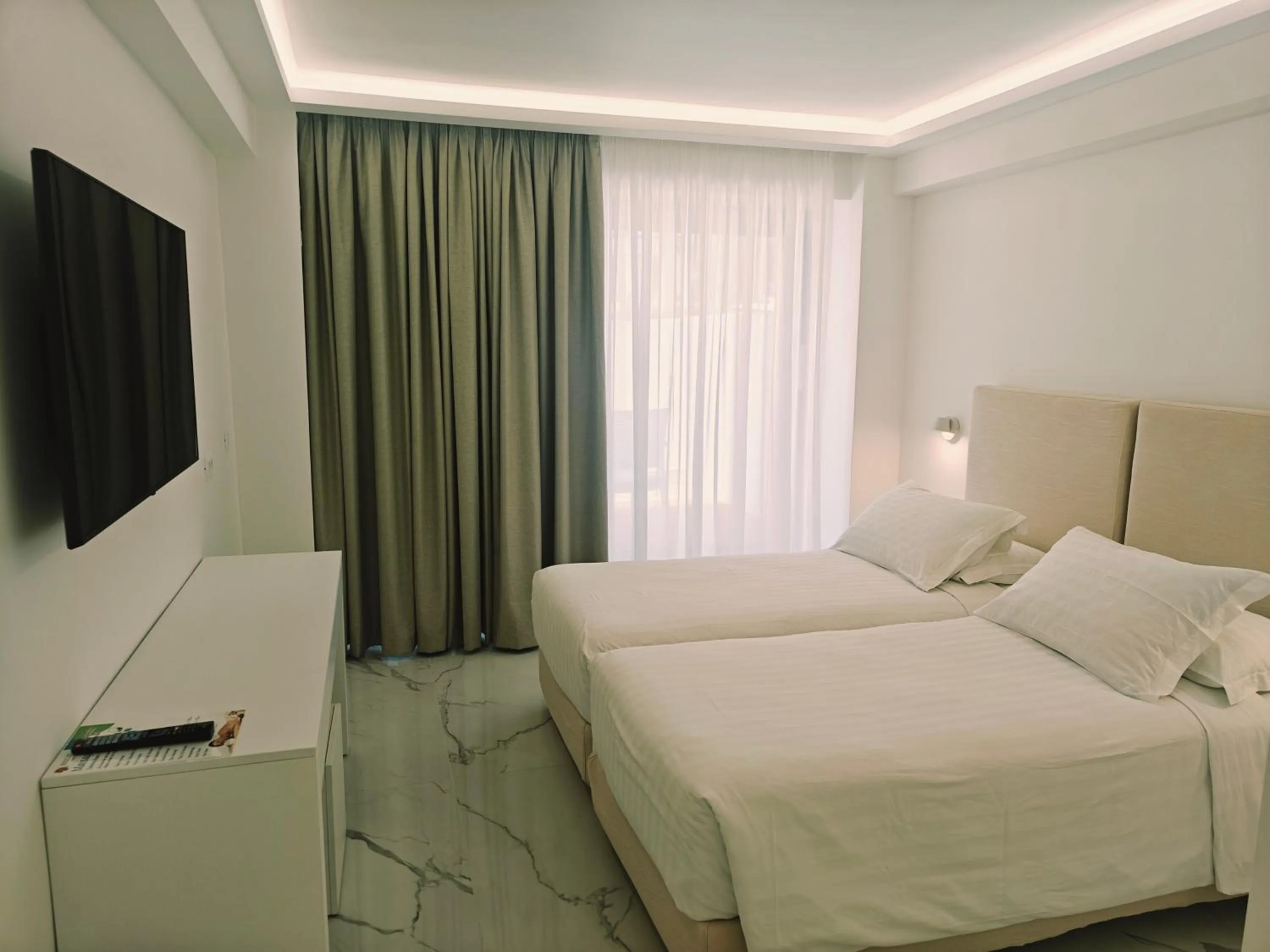 Bed in Ibiscus Hotel
