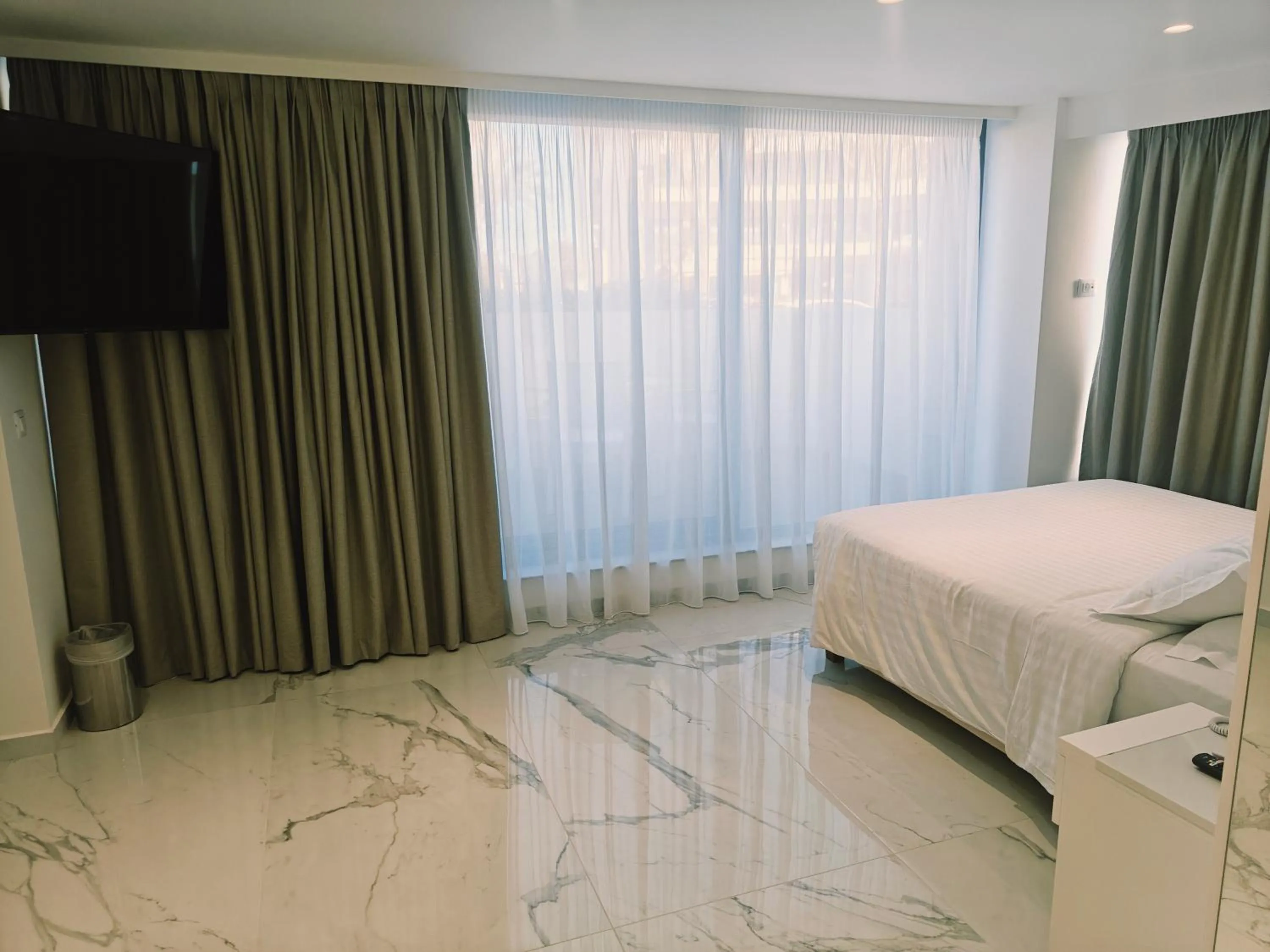 Bed in Ibiscus Hotel