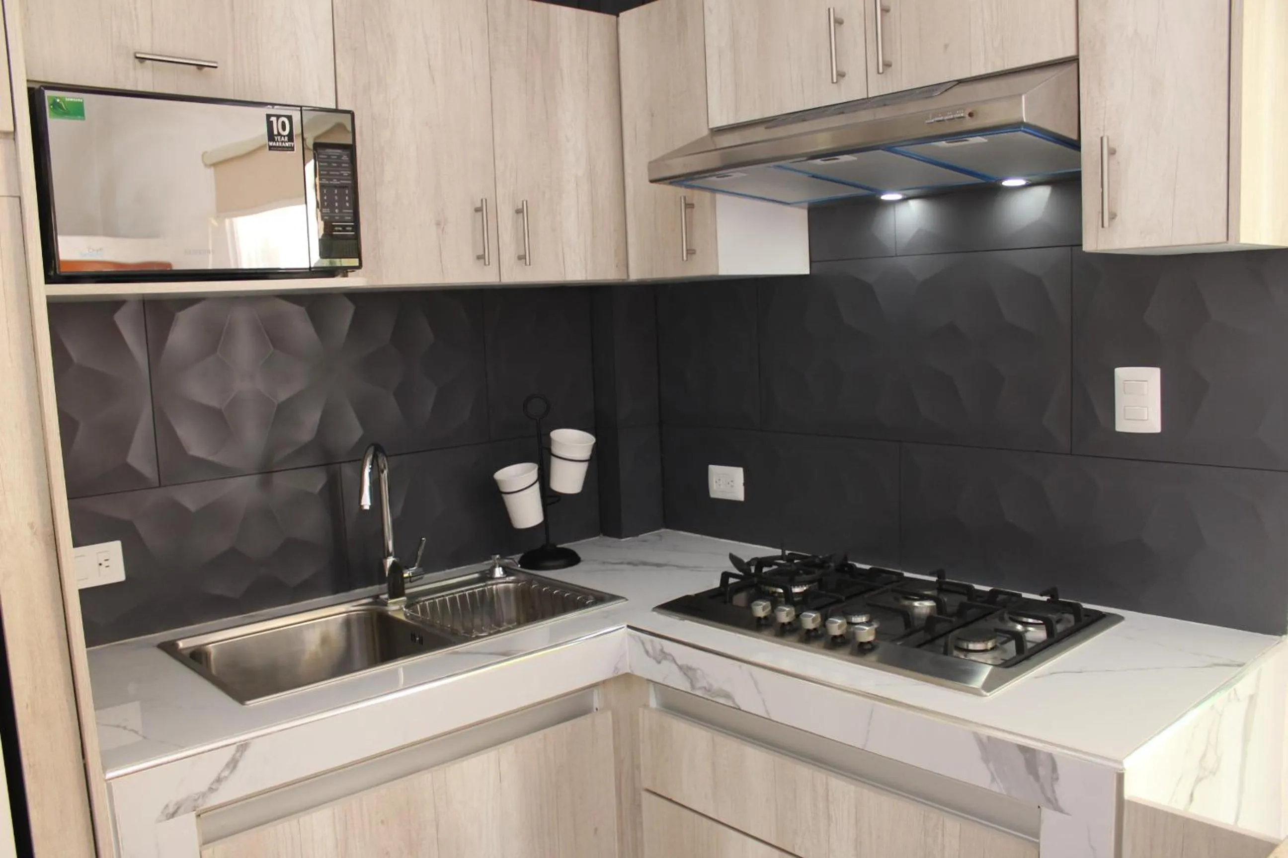 Kitchen or kitchenette in Hotel Scarlette