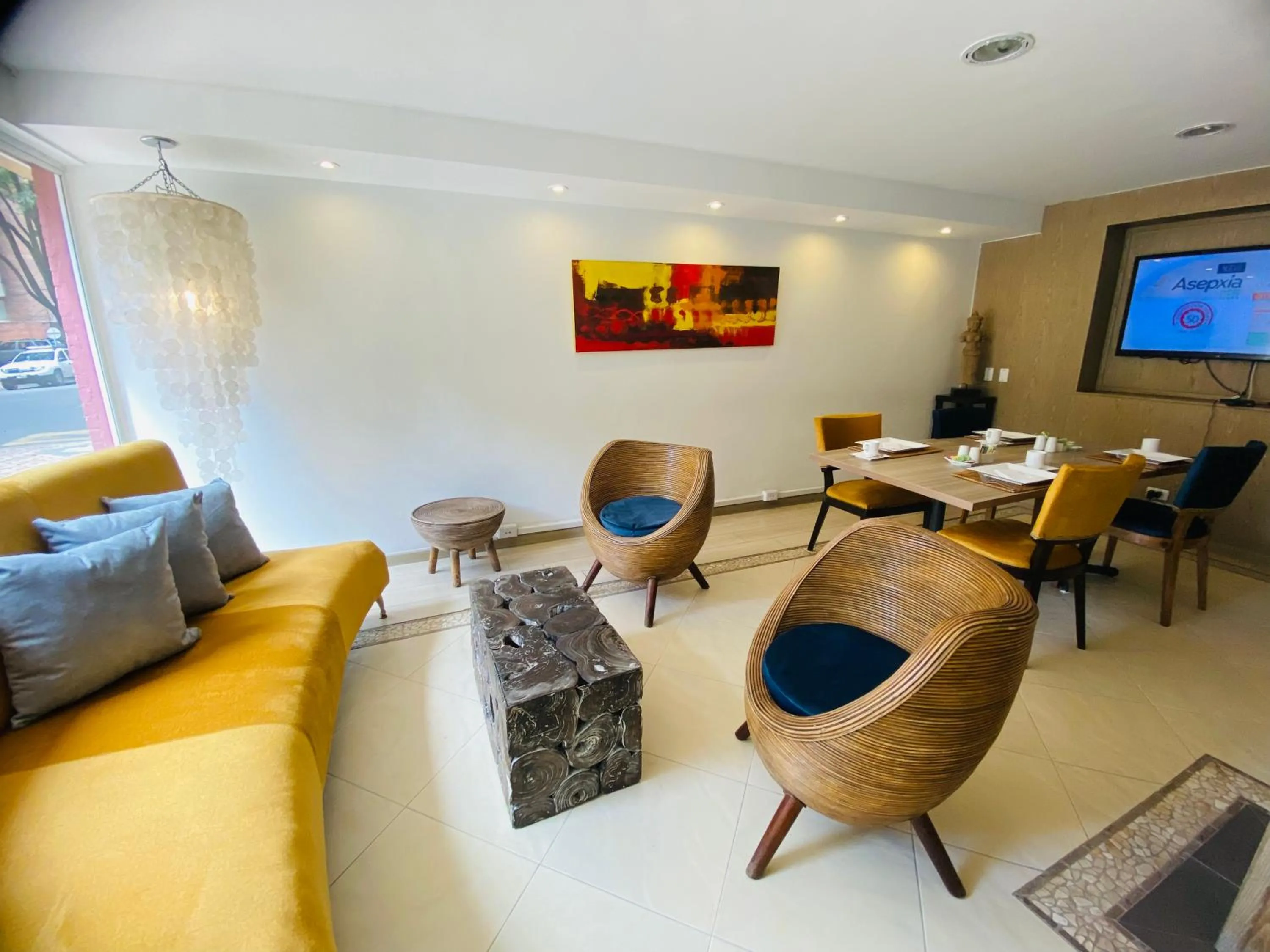 Living room in Hotel Retiro 84 by MIJ