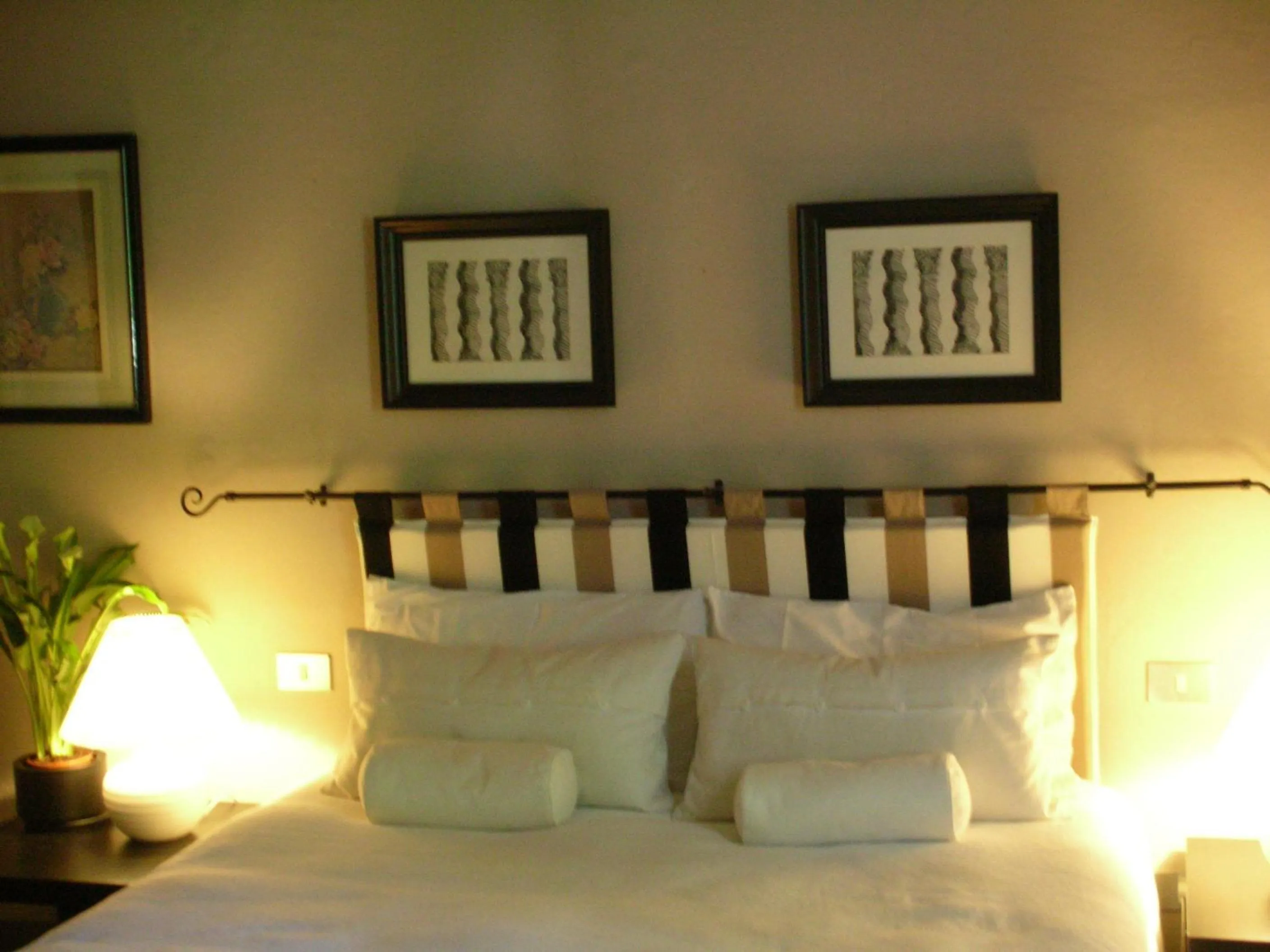 Decorative detail, Bed in Alberghino B&B