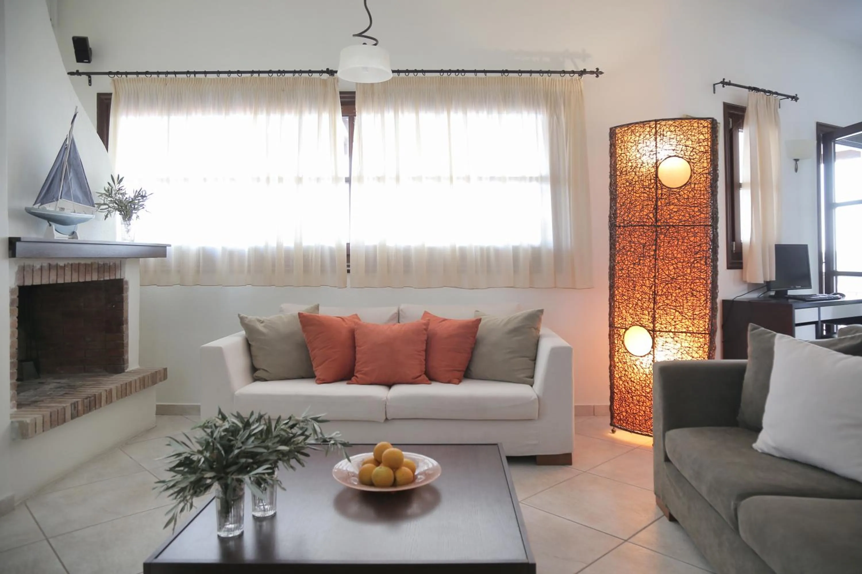 Communal lounge/ TV room in Yalis Hotel