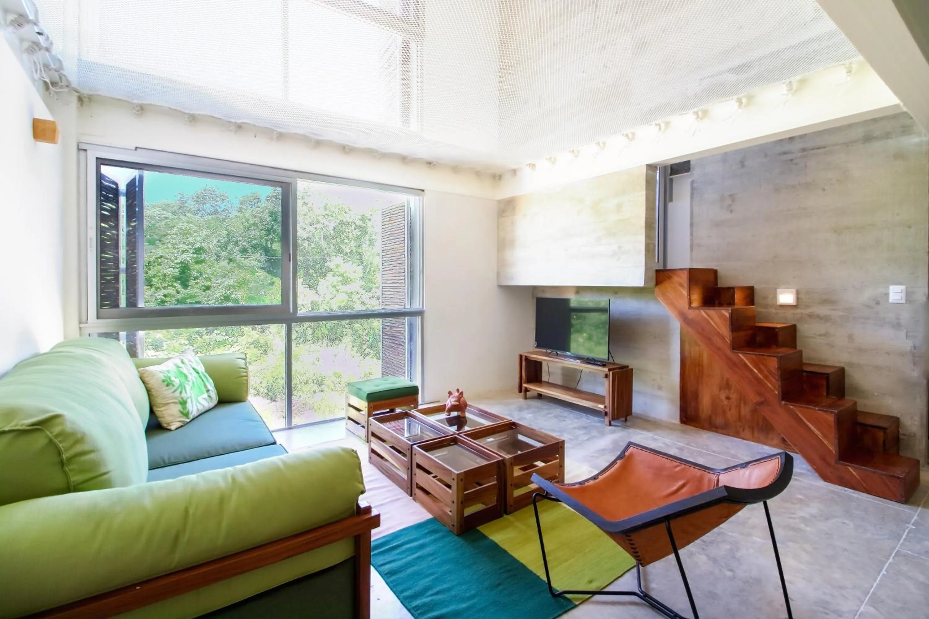 Living room in Casa de Piedra Tulum