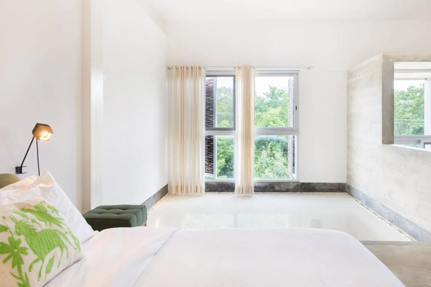 Bed in Casa de Piedra Tulum