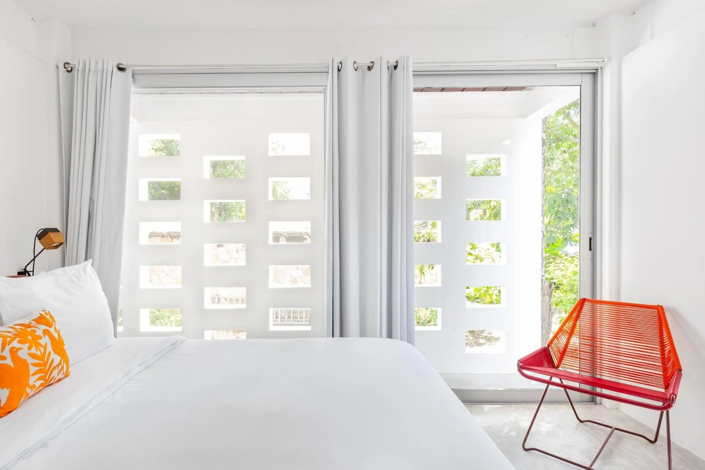 Bed in Casa de Piedra Tulum