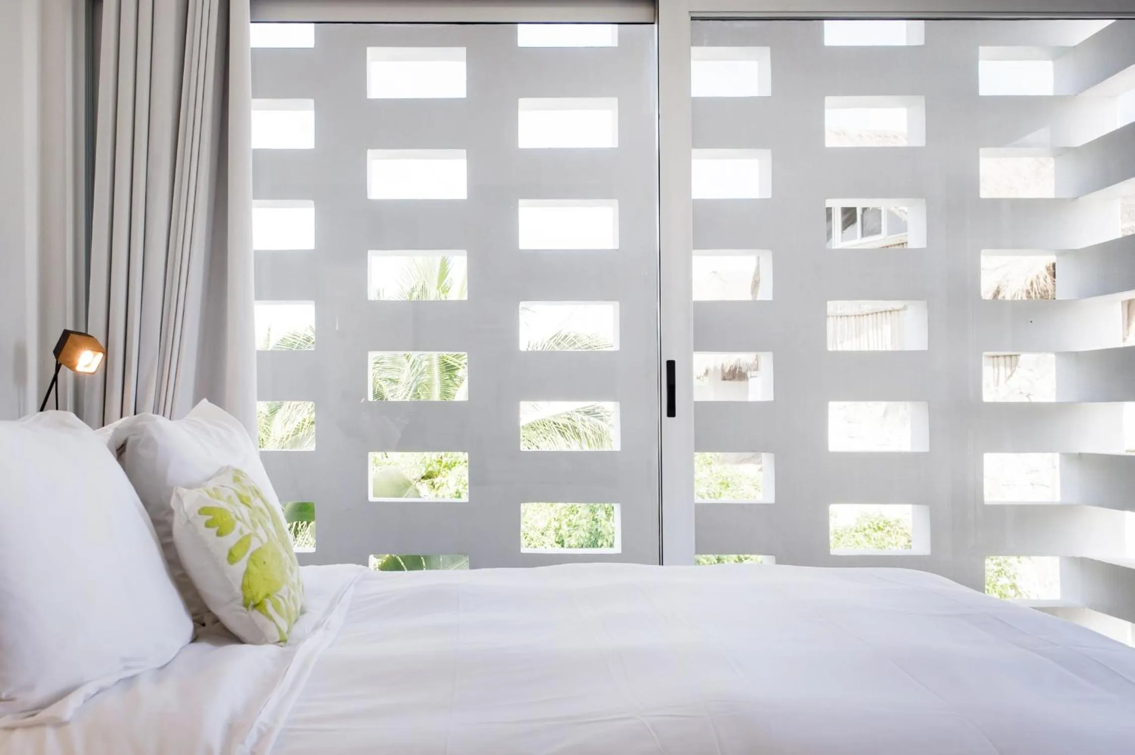 Bed in Casa de Piedra Tulum