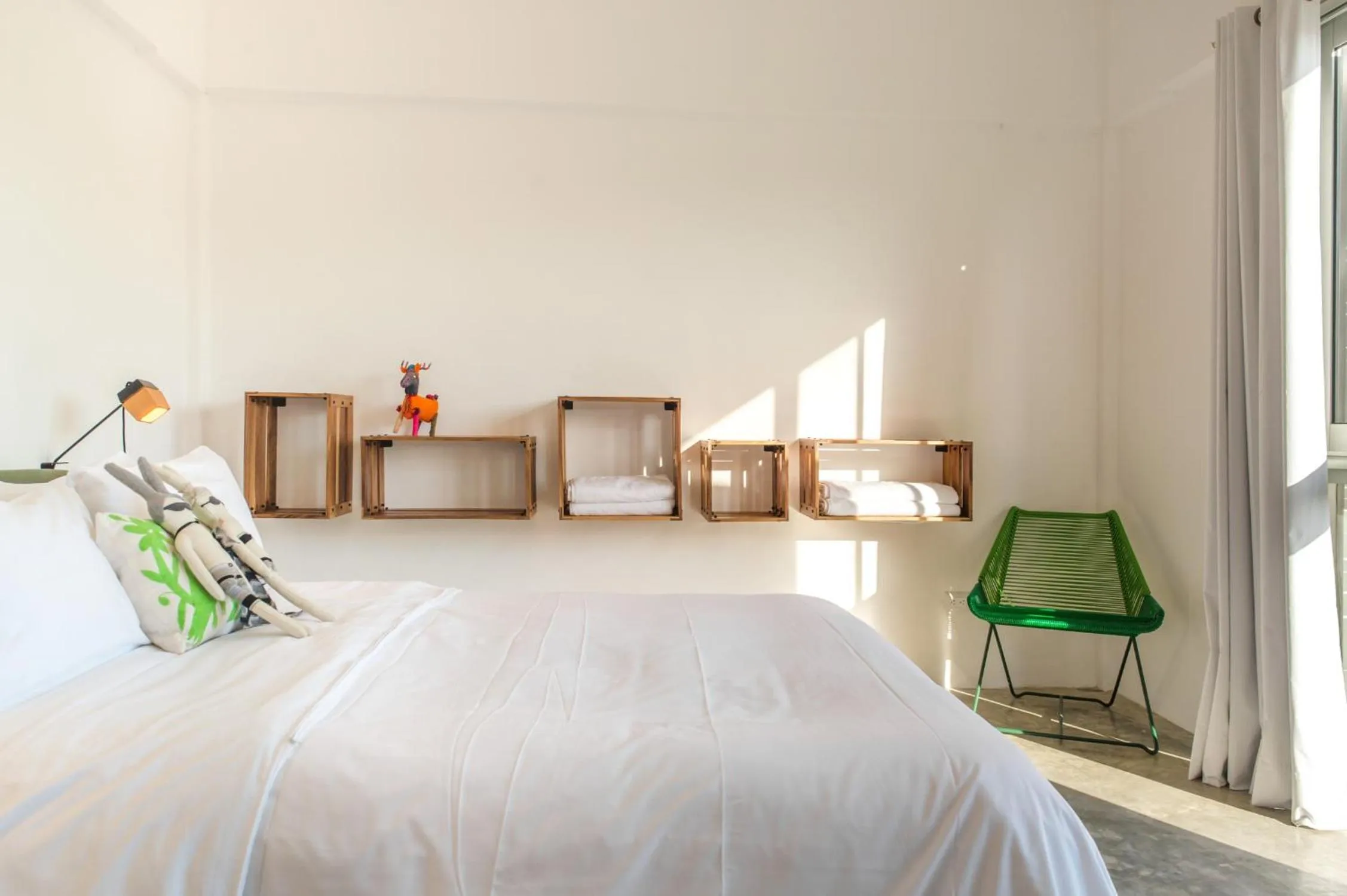 Bed in Casa de Piedra Tulum