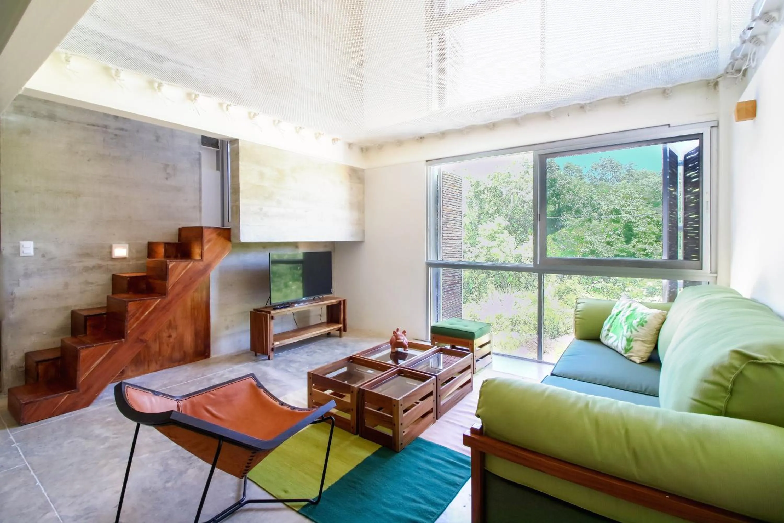 Living room in Casa de Piedra Tulum