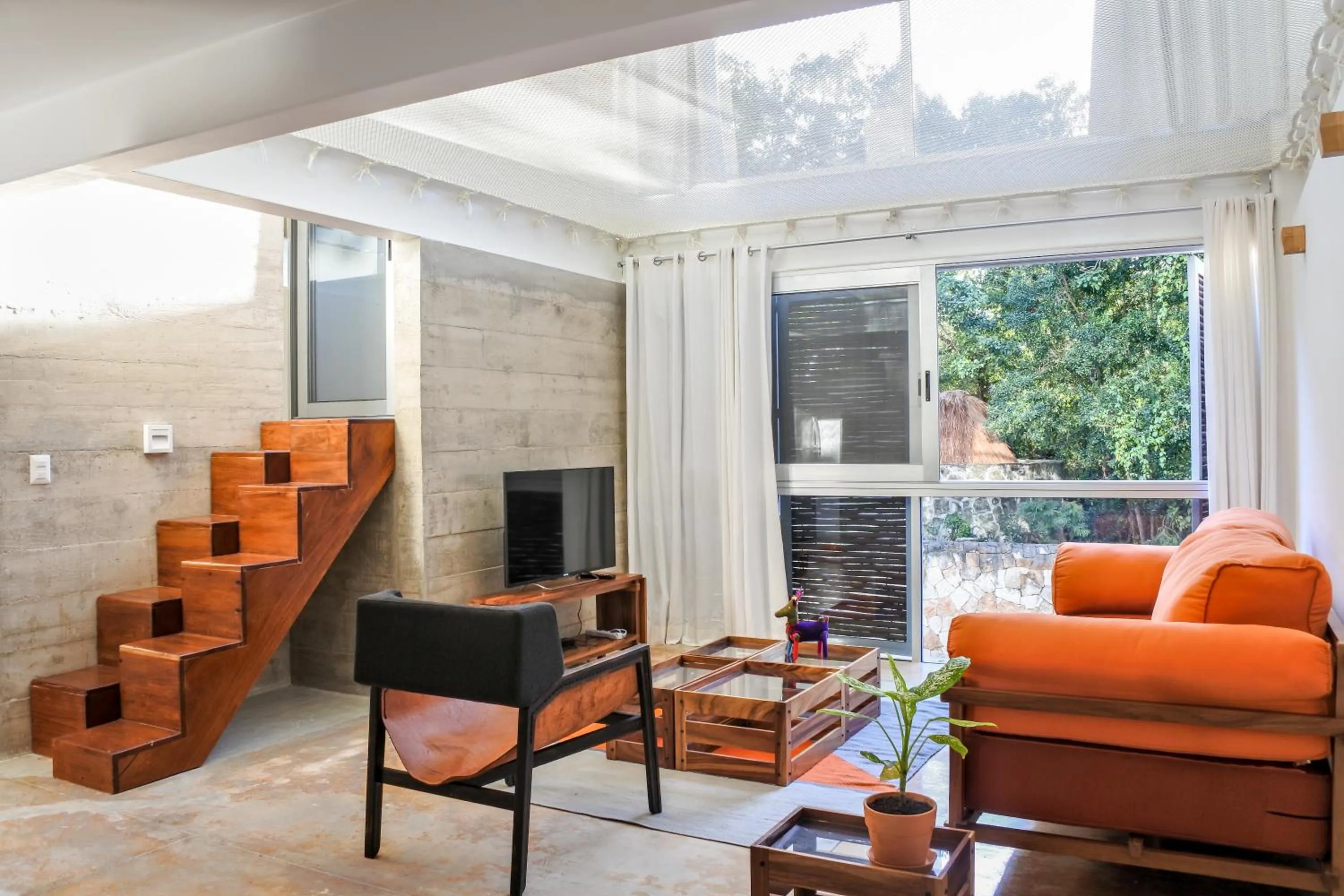 Living room in Casa de Piedra Tulum