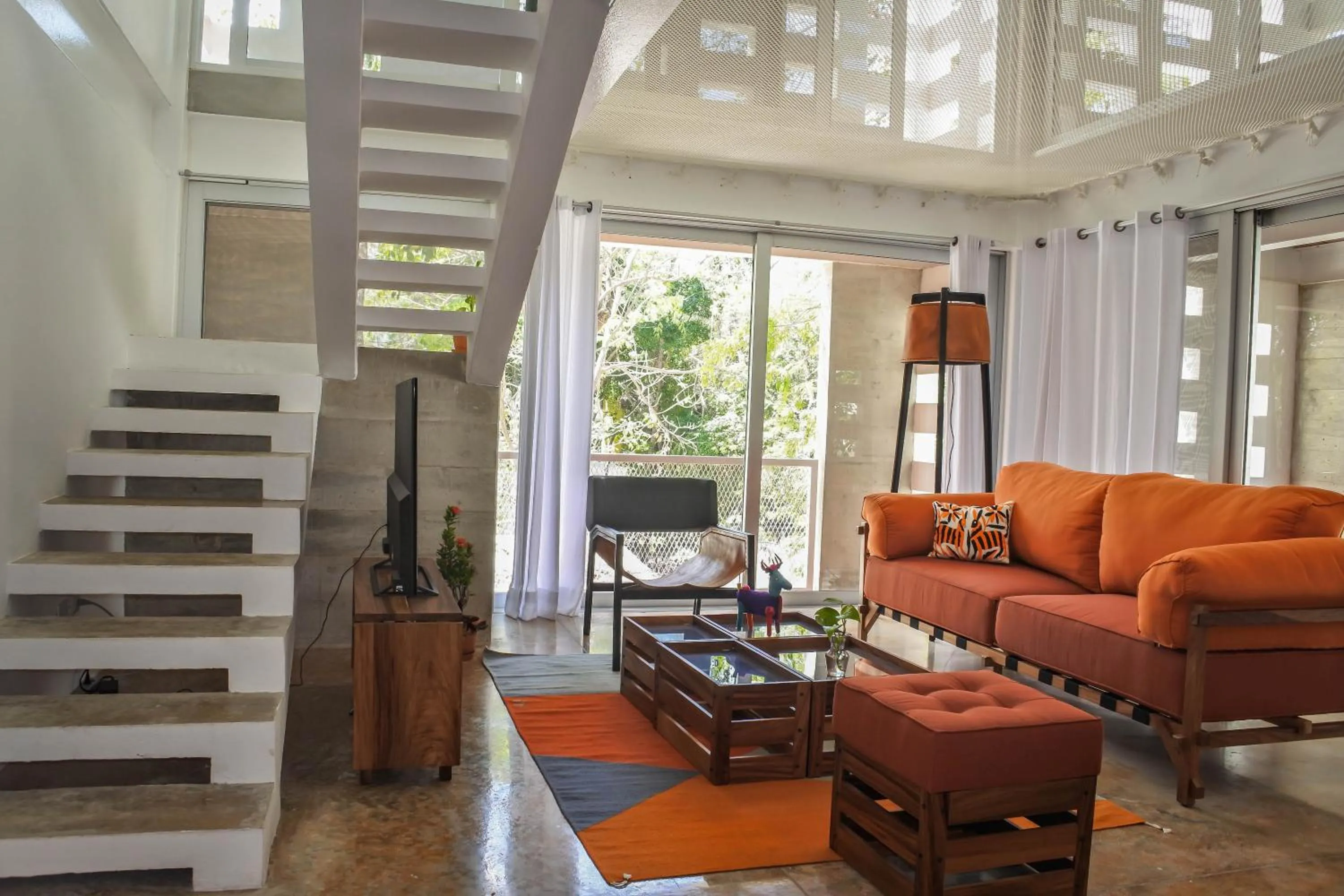 Living room in Casa de Piedra Tulum