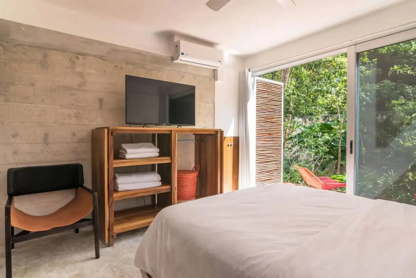 Bed in Casa de Piedra Tulum