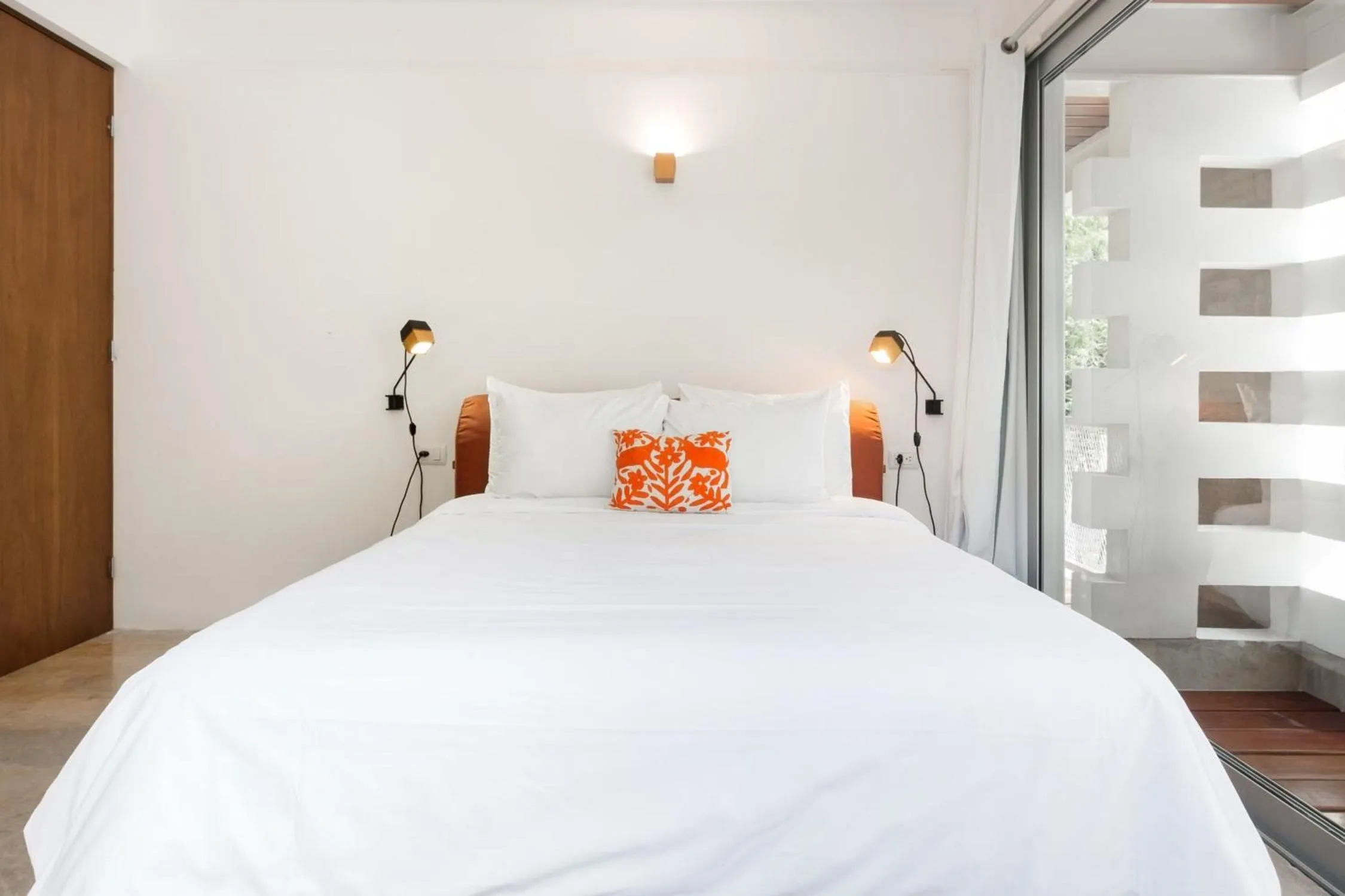 Bed in Casa de Piedra Tulum