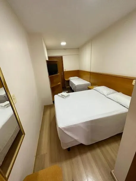 Bed in Condall Palace Hotel