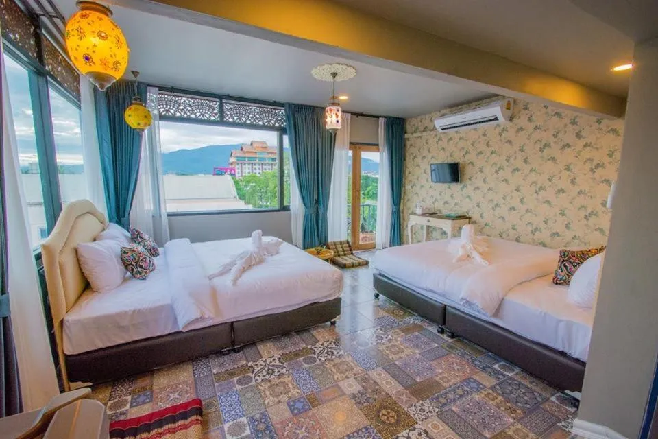 Photo of the whole room, Bed in Sridonchai Heritage, Night Bazaar Chiang Mai