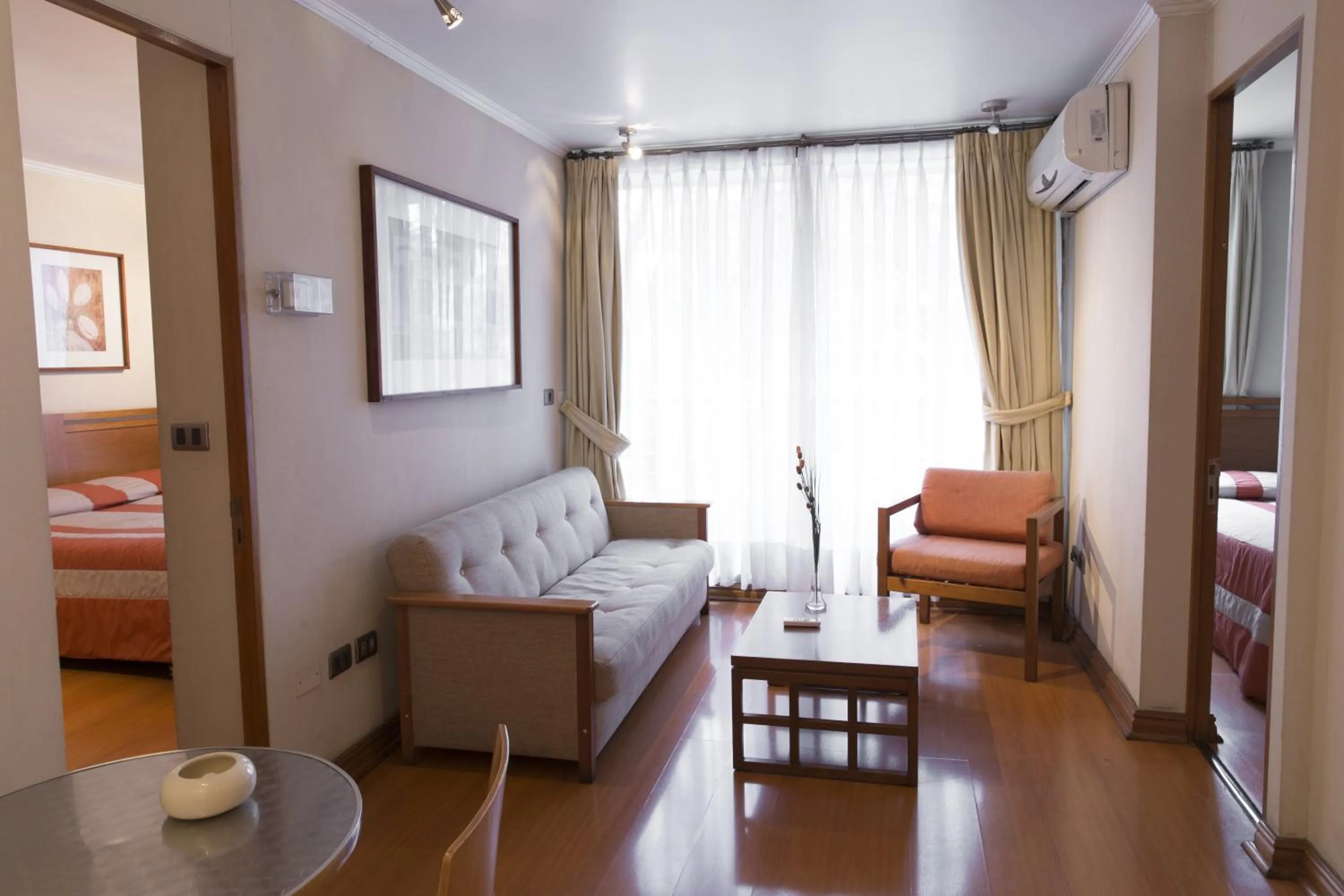 Living room, Bed in Andes Suites