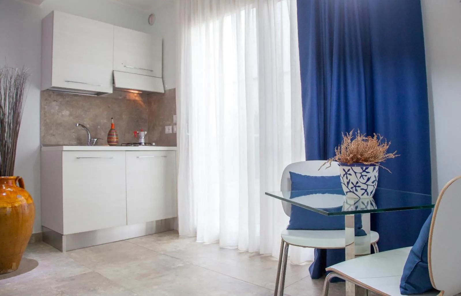 Kitchen or kitchenette in Le Sinfonie Rooms
