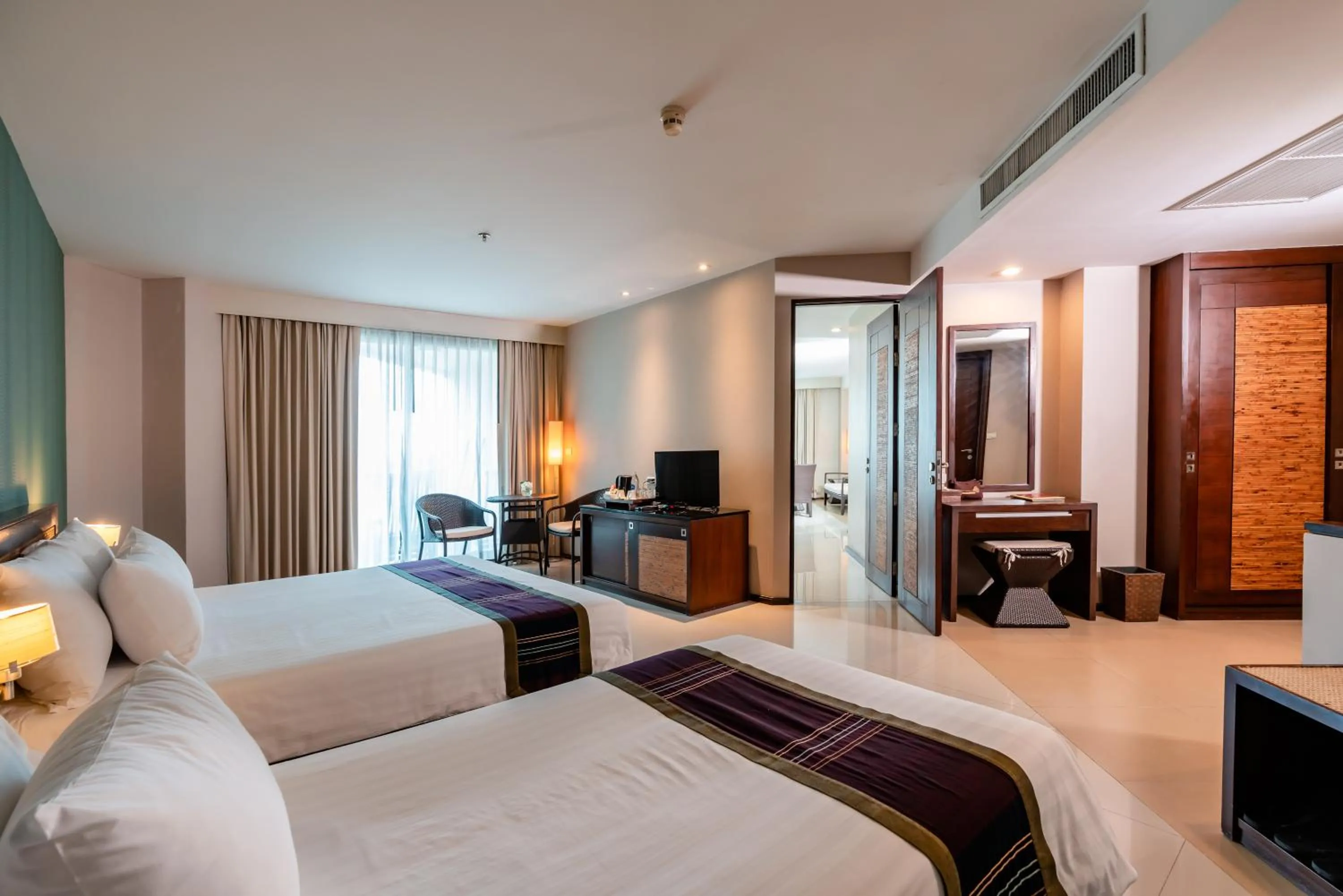 Bed in Tara Mantra Cha-Am Resort