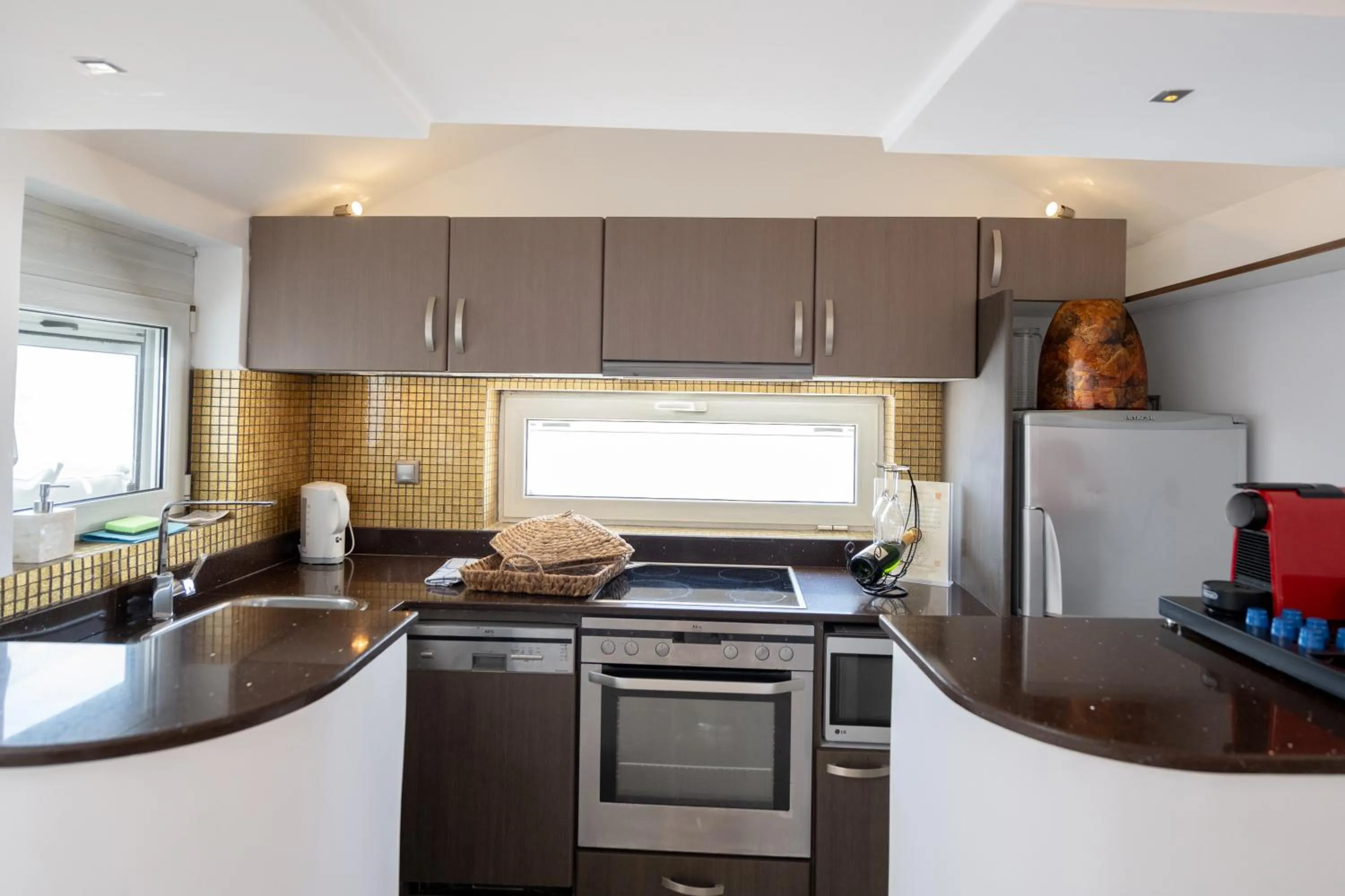 Kitchen or kitchenette in Hyperion Oia Suites