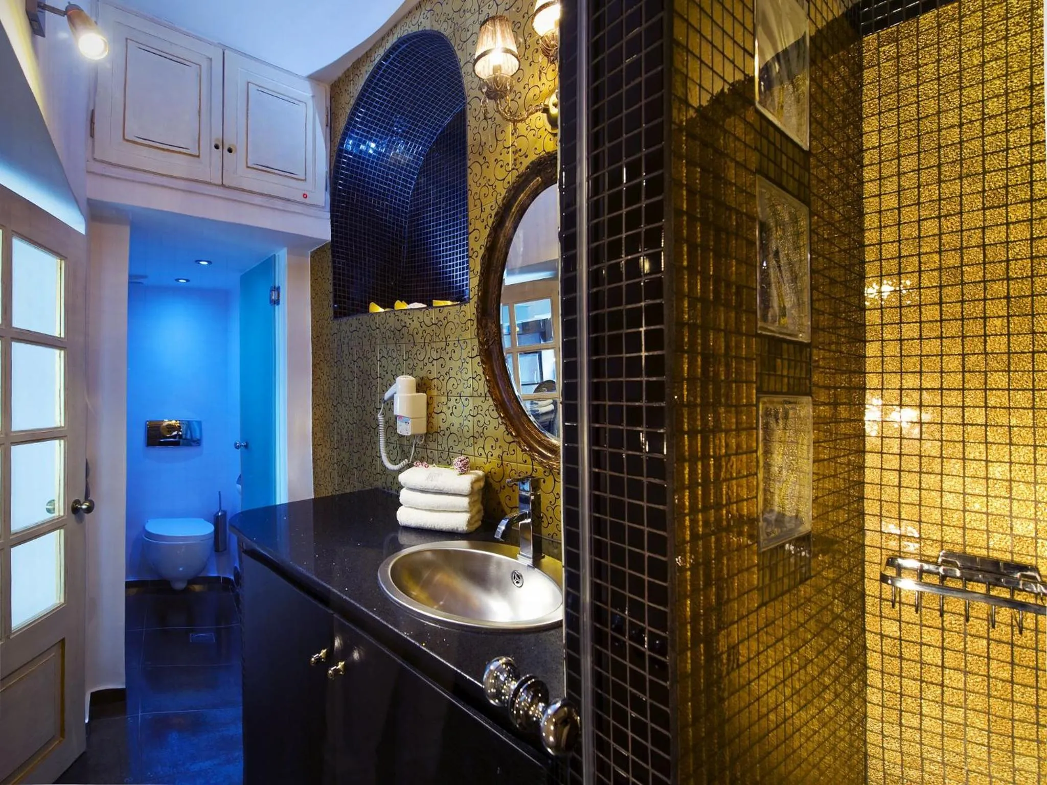 Bathroom in Hyperion Oia Suites