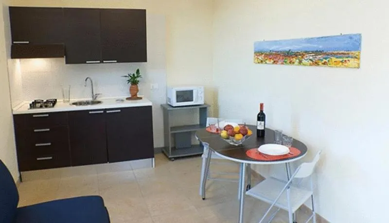 Kitchen or kitchenette in Palazzo Serraino Residence