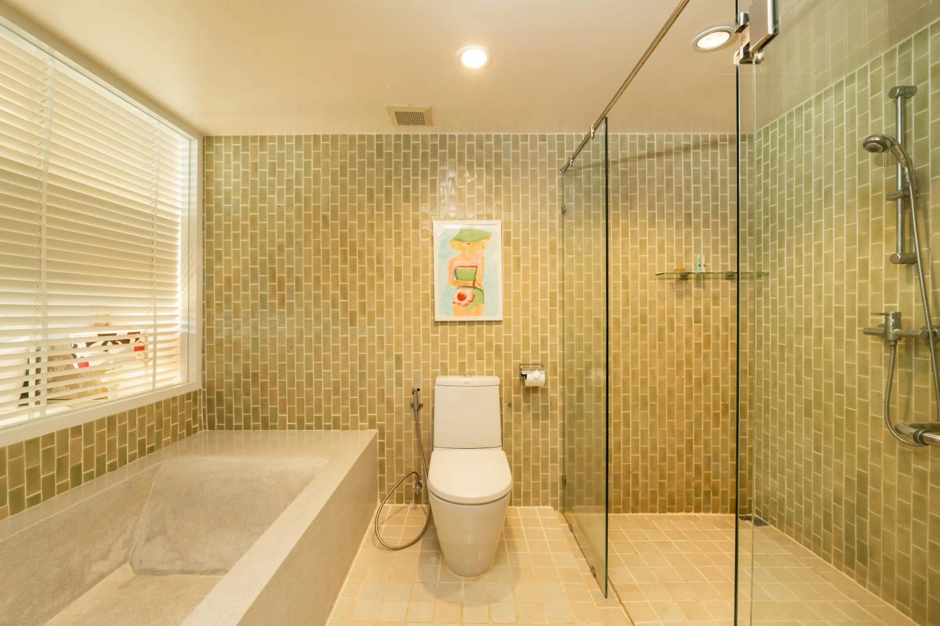 Bathroom in The Briza Beach Resort, Khao Lak SHA Extra Plus