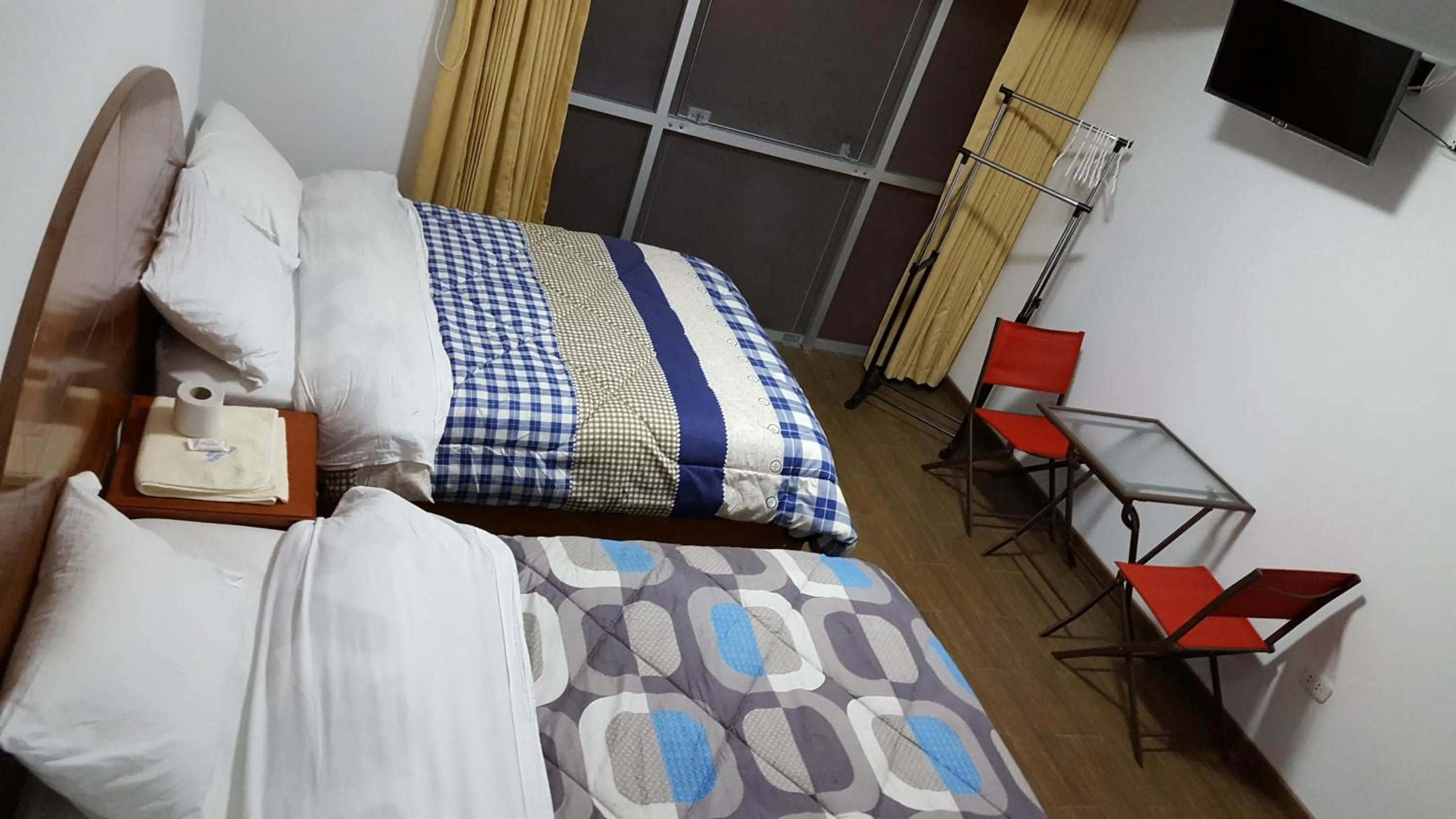 Bed in Hotel Shelter