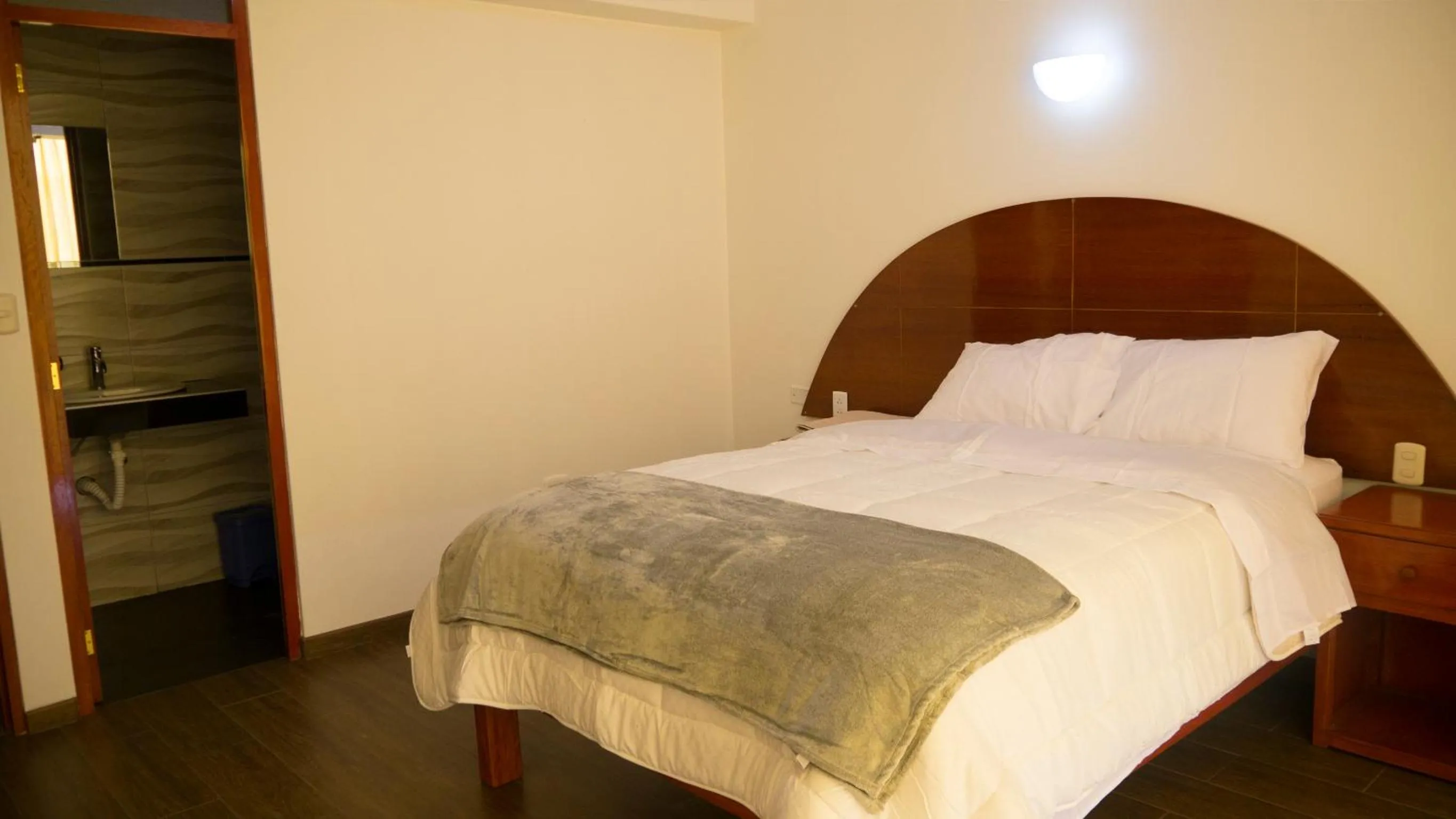 Bed in Hotel Shelter