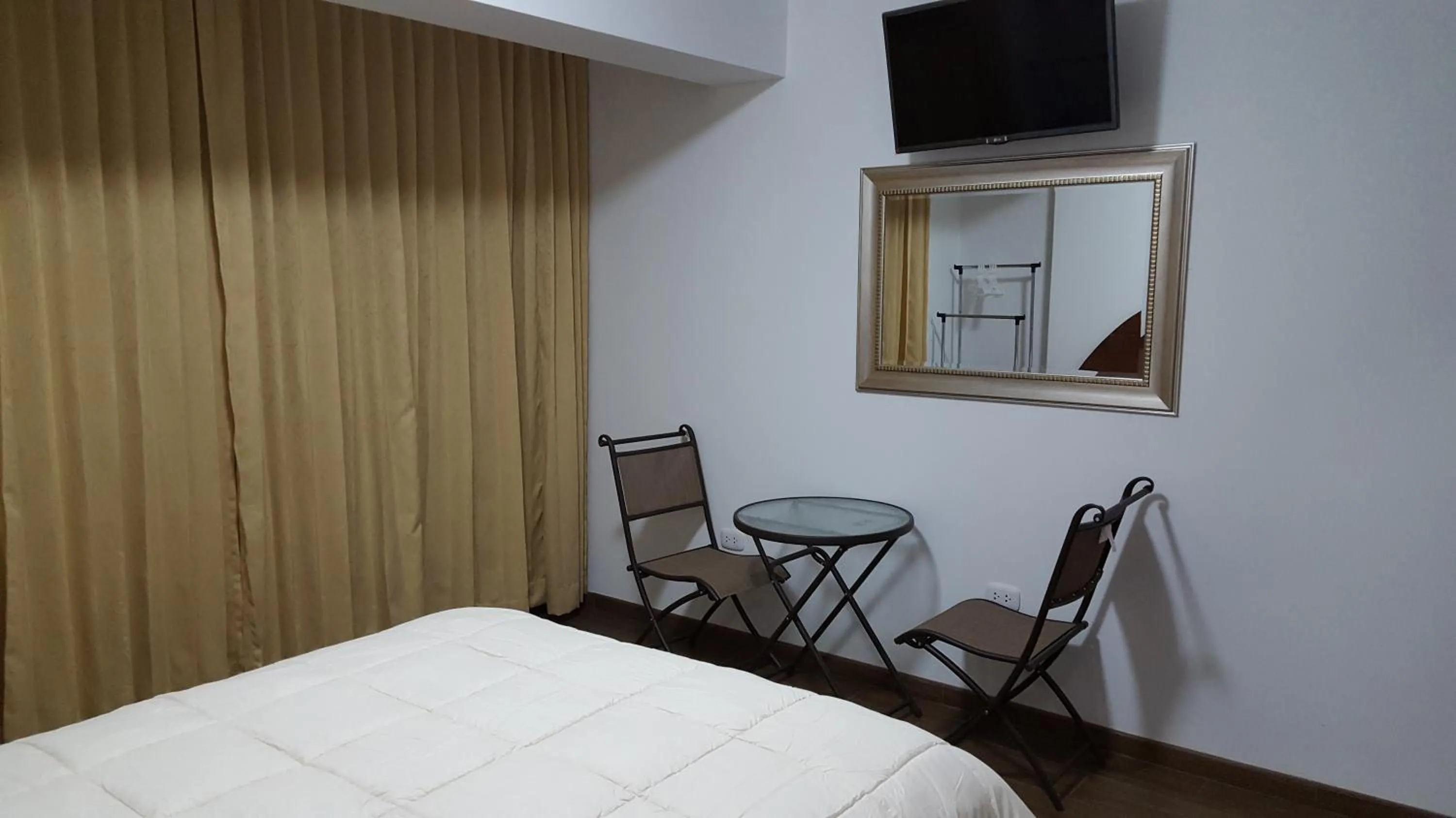 Bed in Hotel Shelter