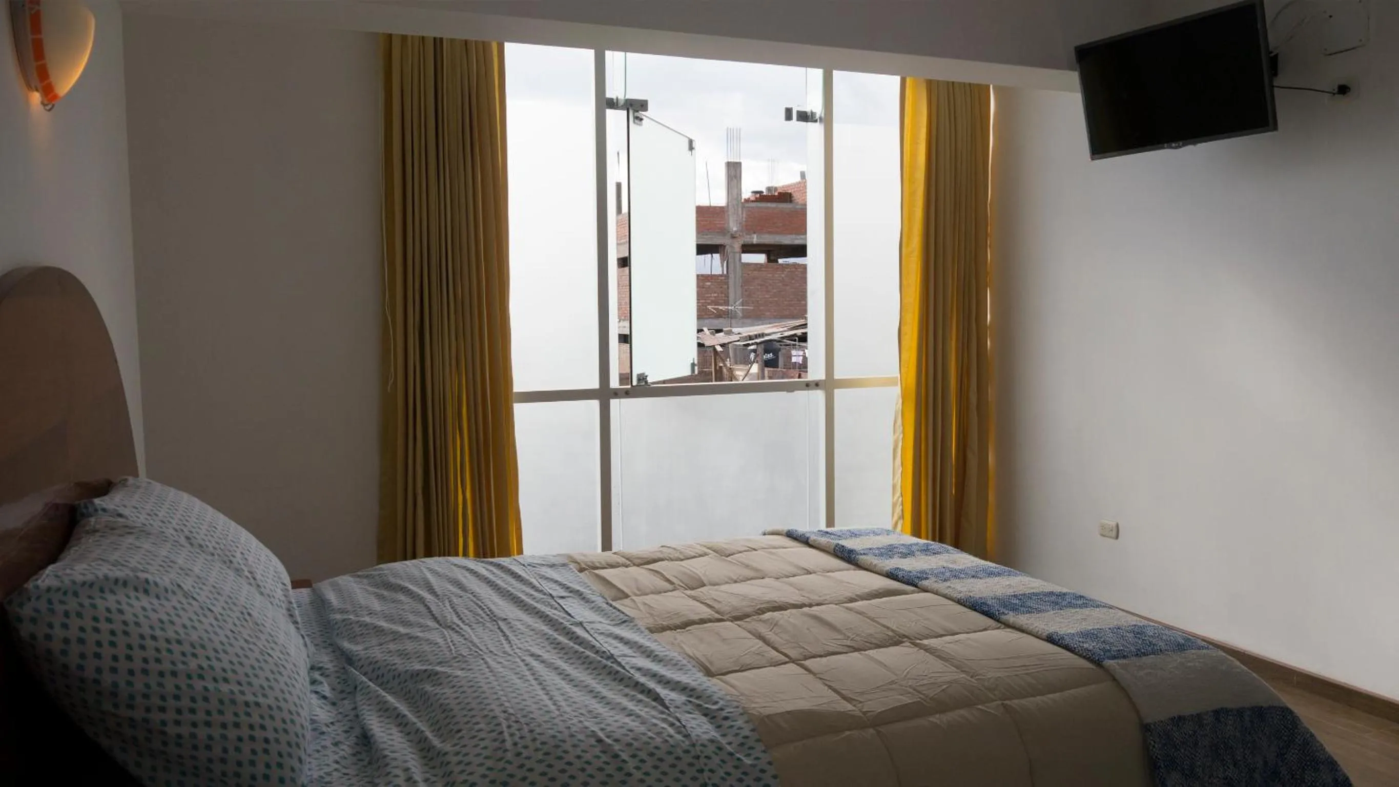 Bed in Hotel Shelter