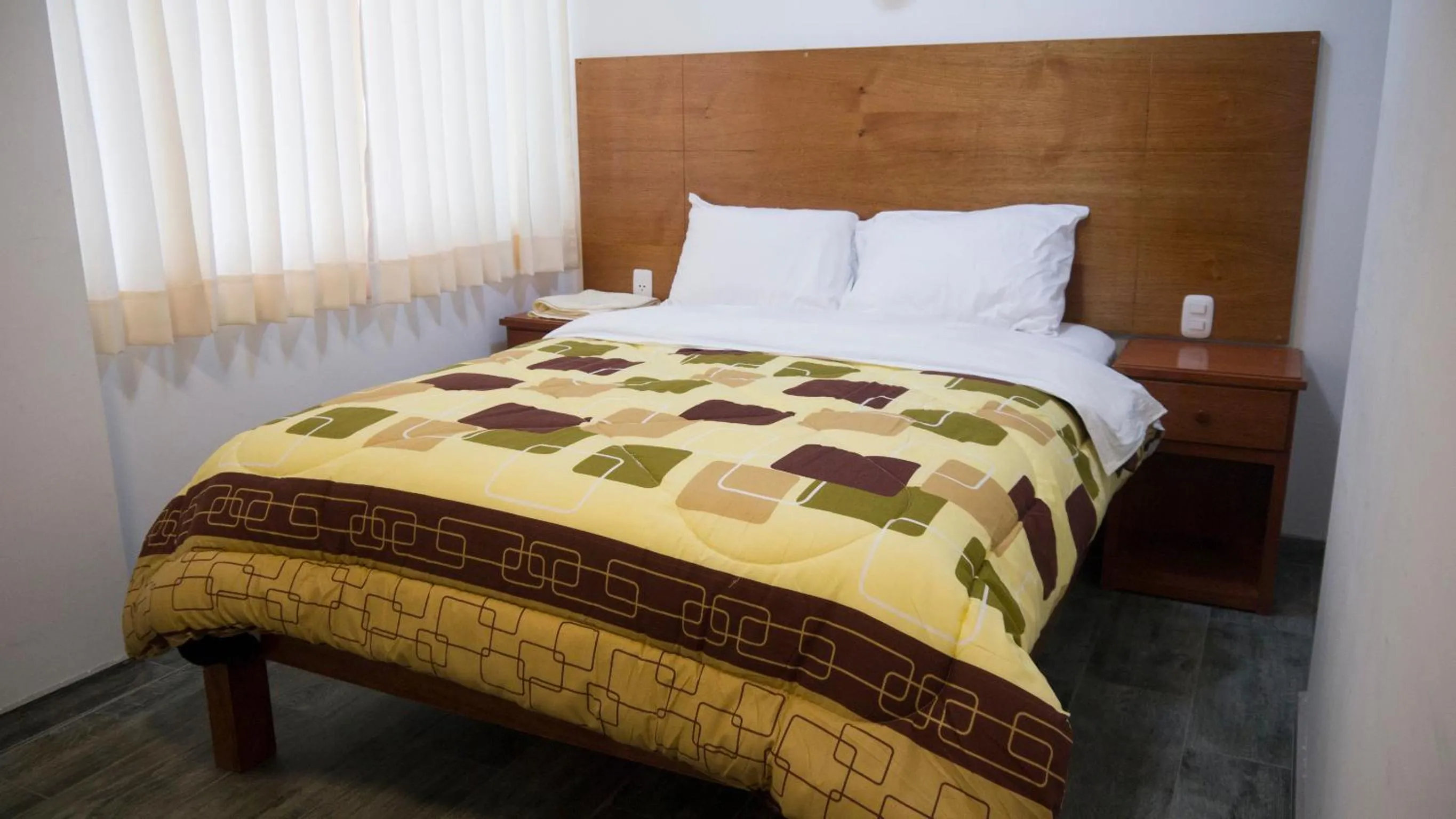 Bed in Hotel Shelter