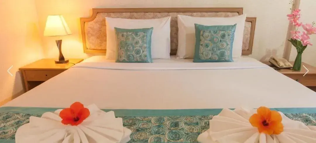 Bed in Takiab Beach Resort Bed in Takiab Beach Resort